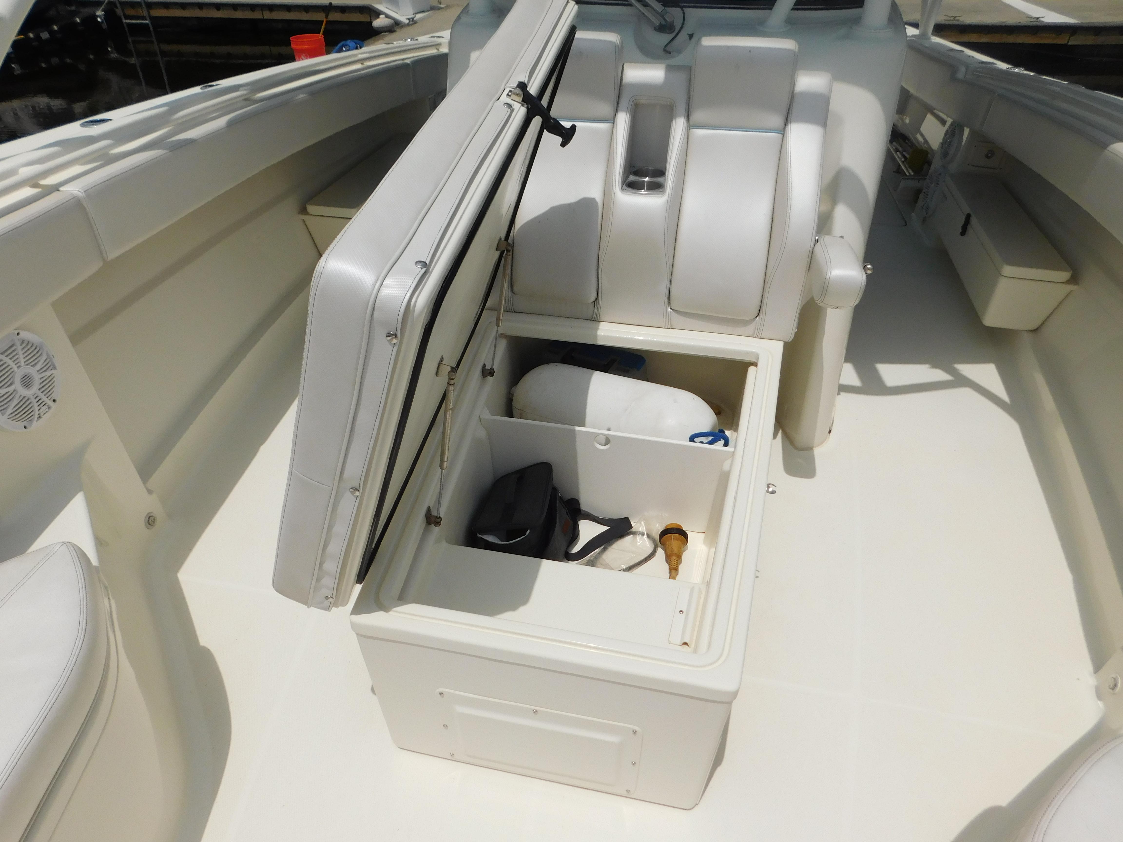 2013 Hydra-Sports 4200 Siesta boat interior with open storage compartment.
