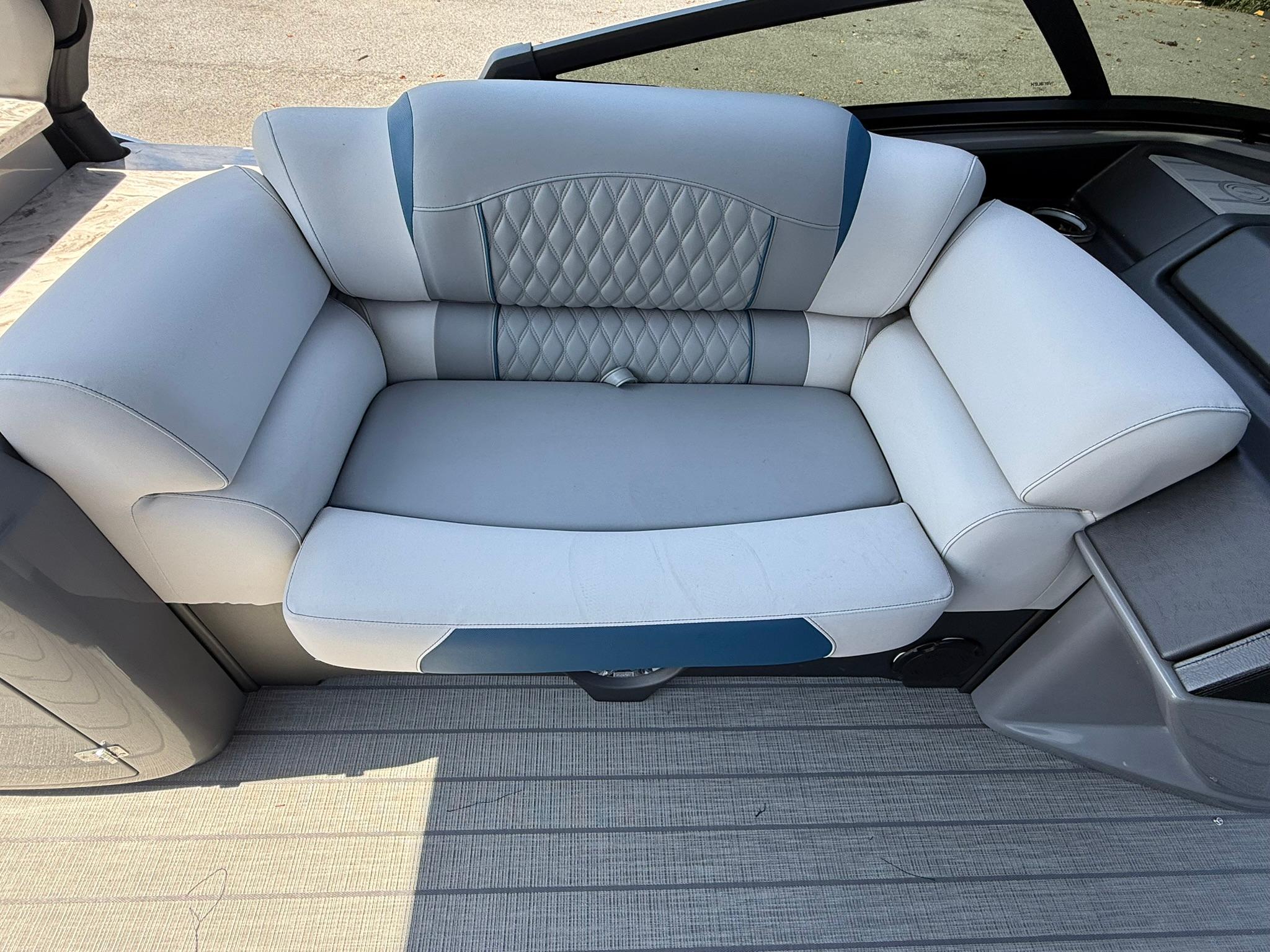 Luxurious seating on 2025 Tahoe Pontoon Grand Tahoe Elite Windshield boat, featuring elegant upholstery.
