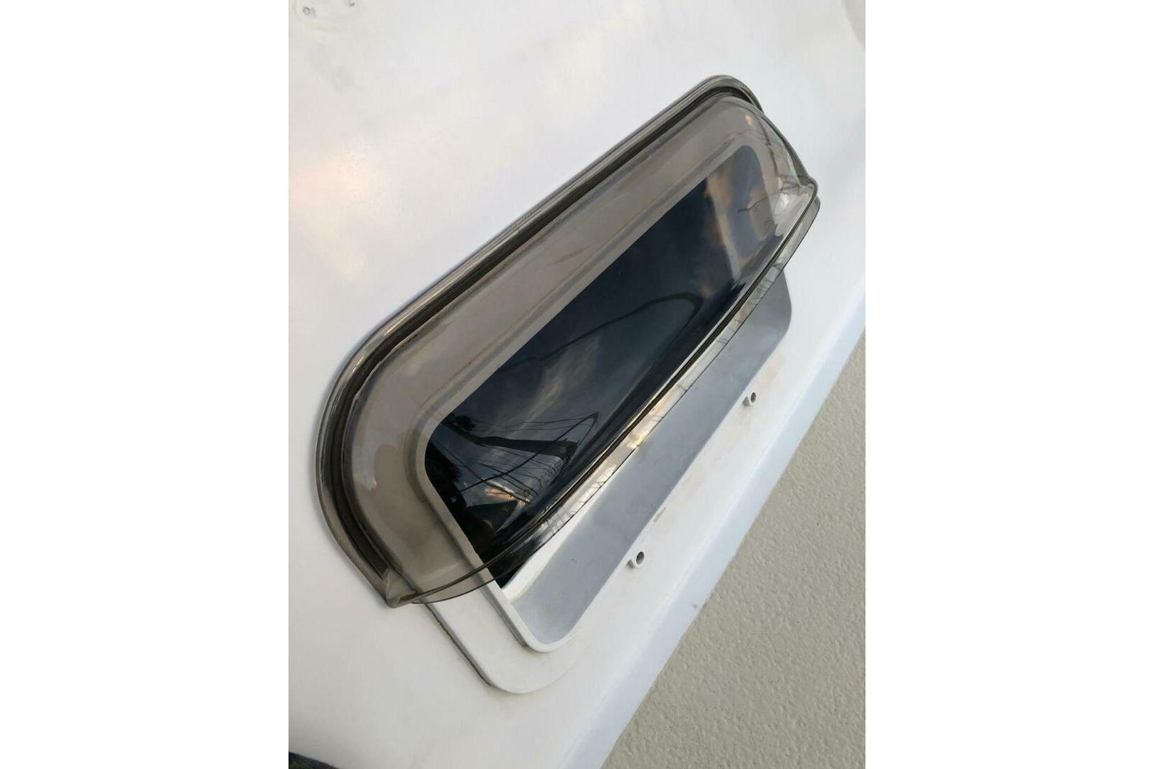 1981 Morgan 462 boat window with sleek, tinted design.