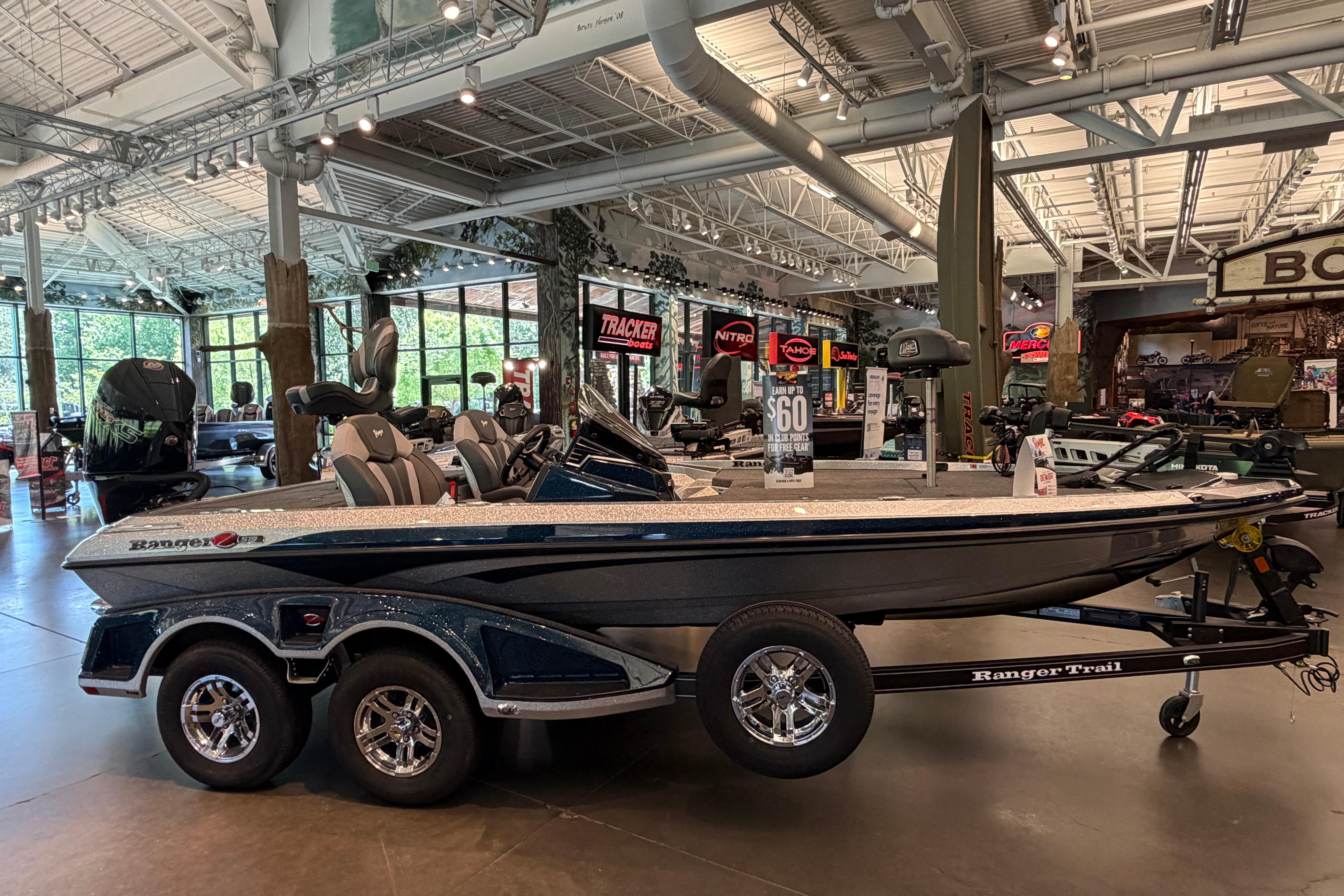2026 Ranger Z519R boat displayed in a showroom with modern interior design.
