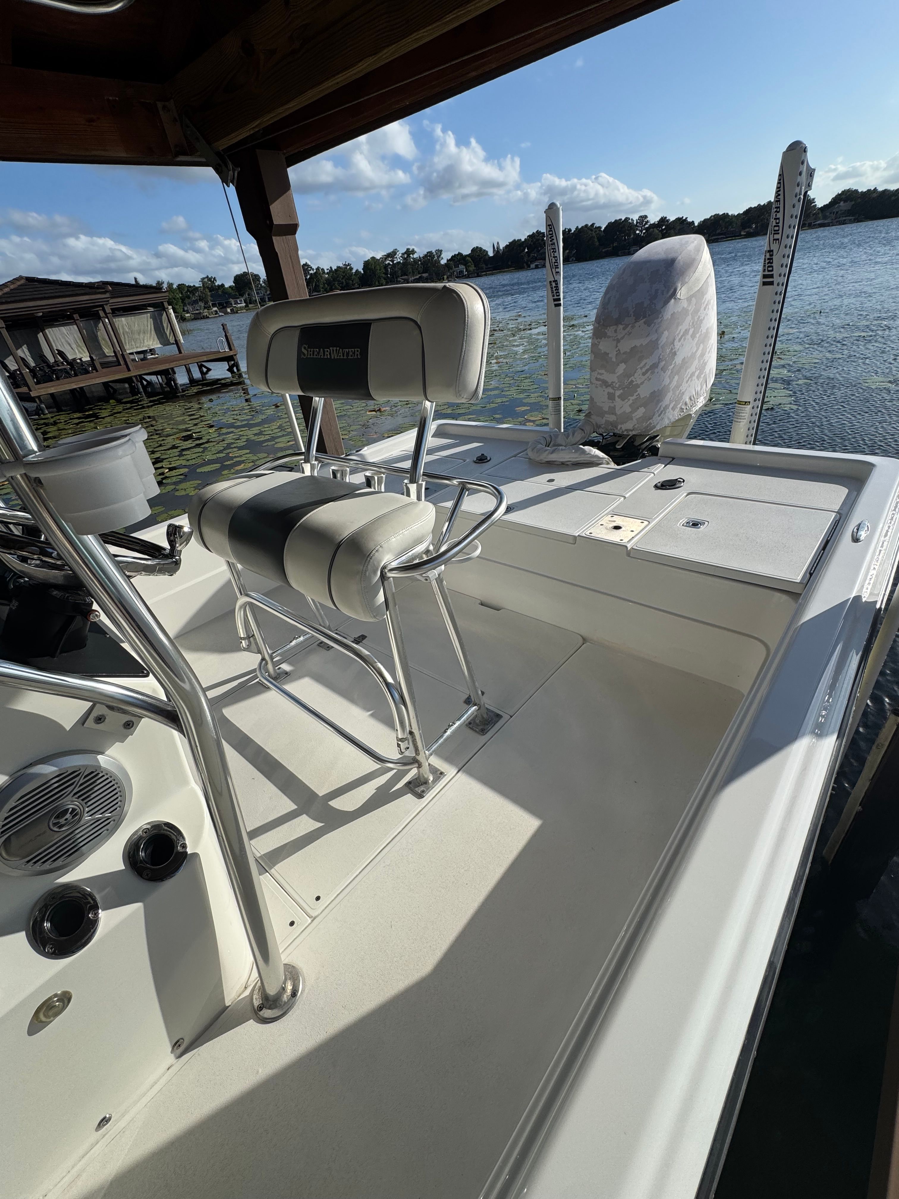 2004 ShearWater LTZ boat at lakeside, sunny day.