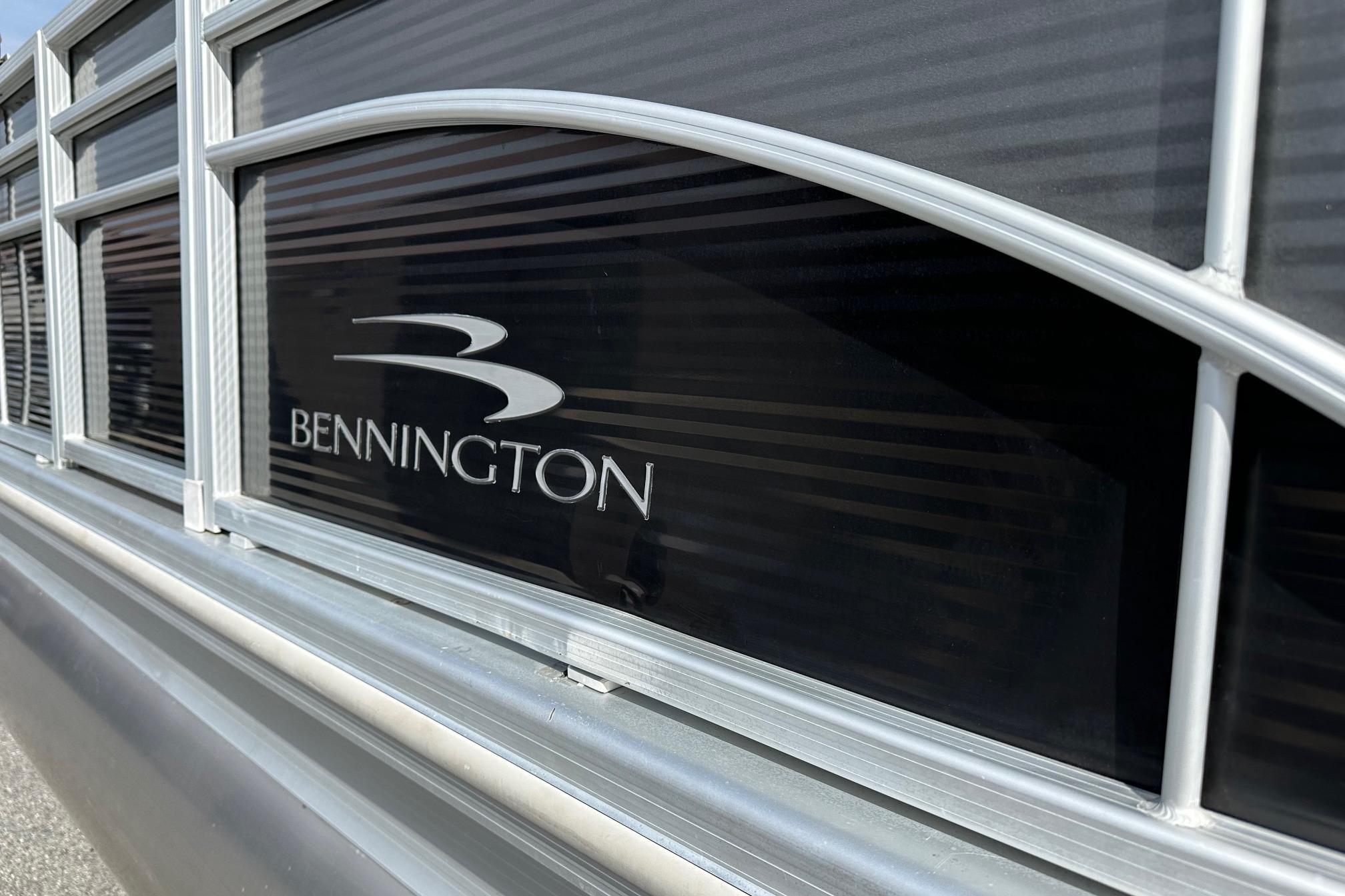 Close-up of 2017 Bennington 22 GPD boat logo on metallic surface.