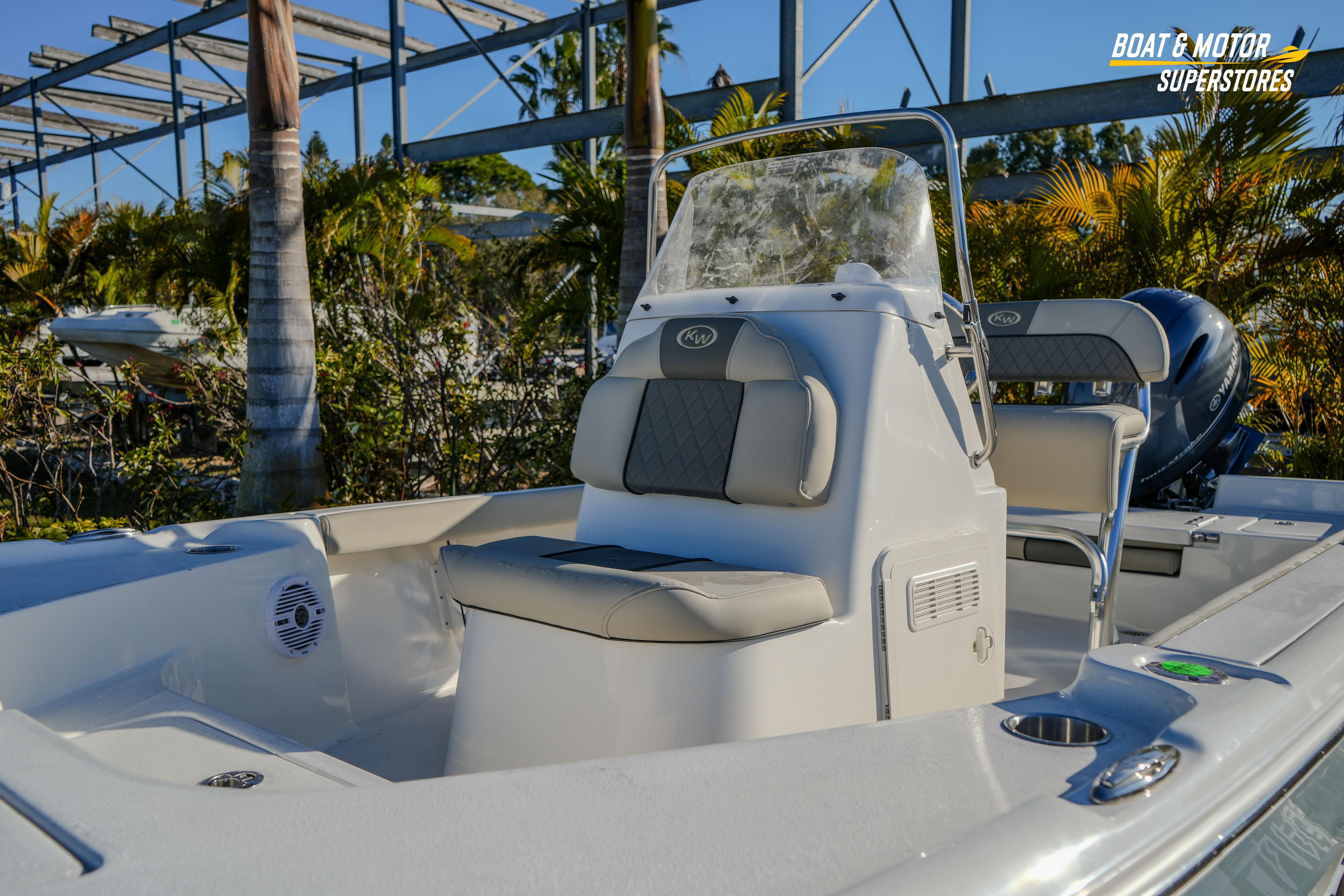 2026 Key West 188 Bay Reef boat with seating and console, displayed outdoors.