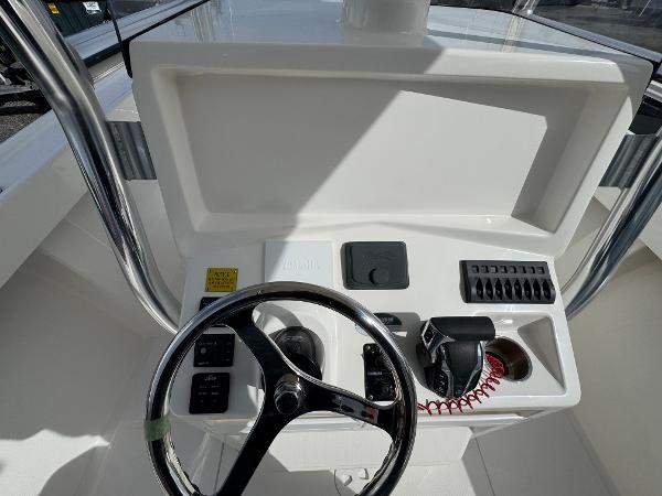 2025 NorthCoast 230 Center Console boat dashboard with steering wheel and controls.