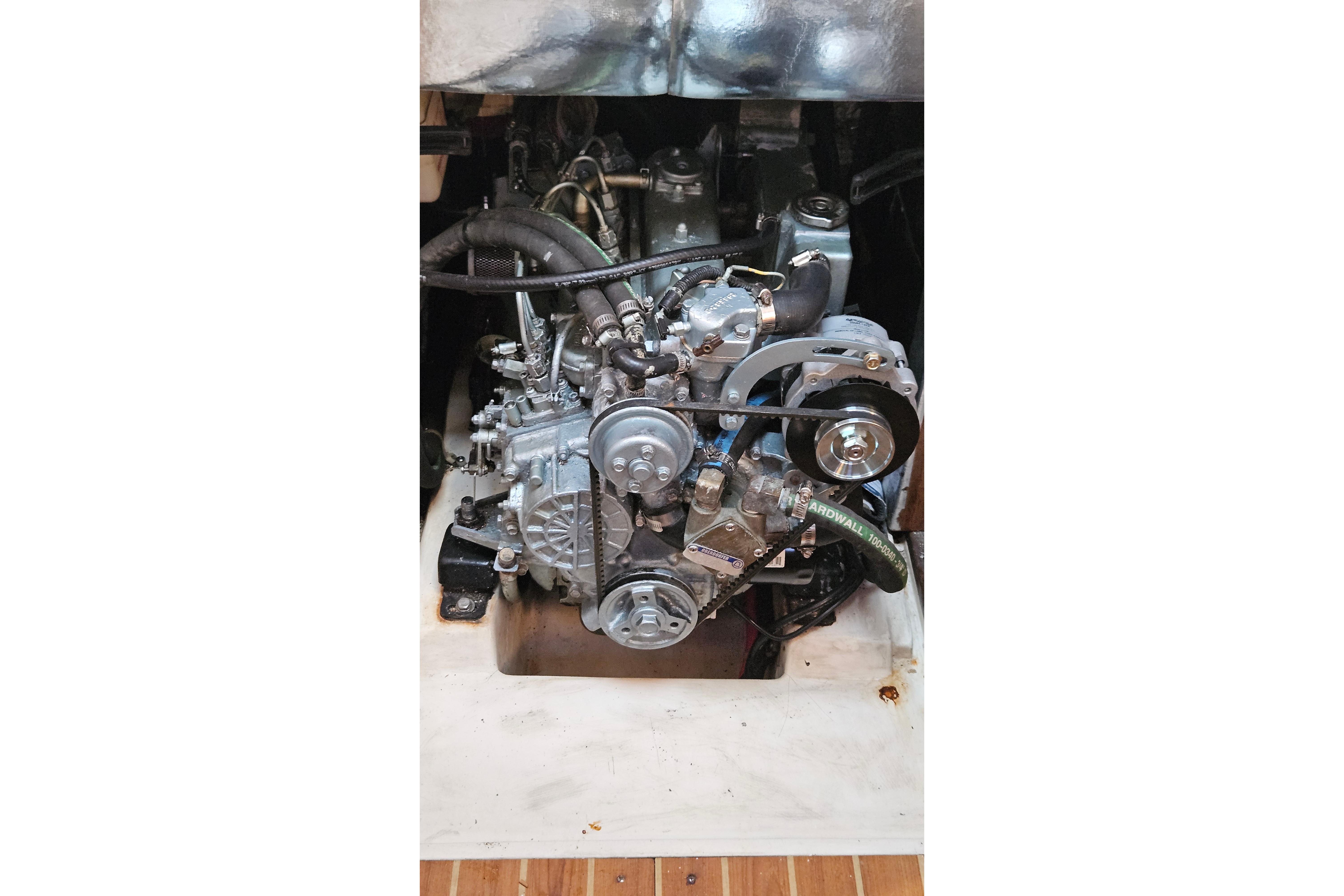 Engine of a 2005 Catalina 350 sailboat, showcasing mechanical components.