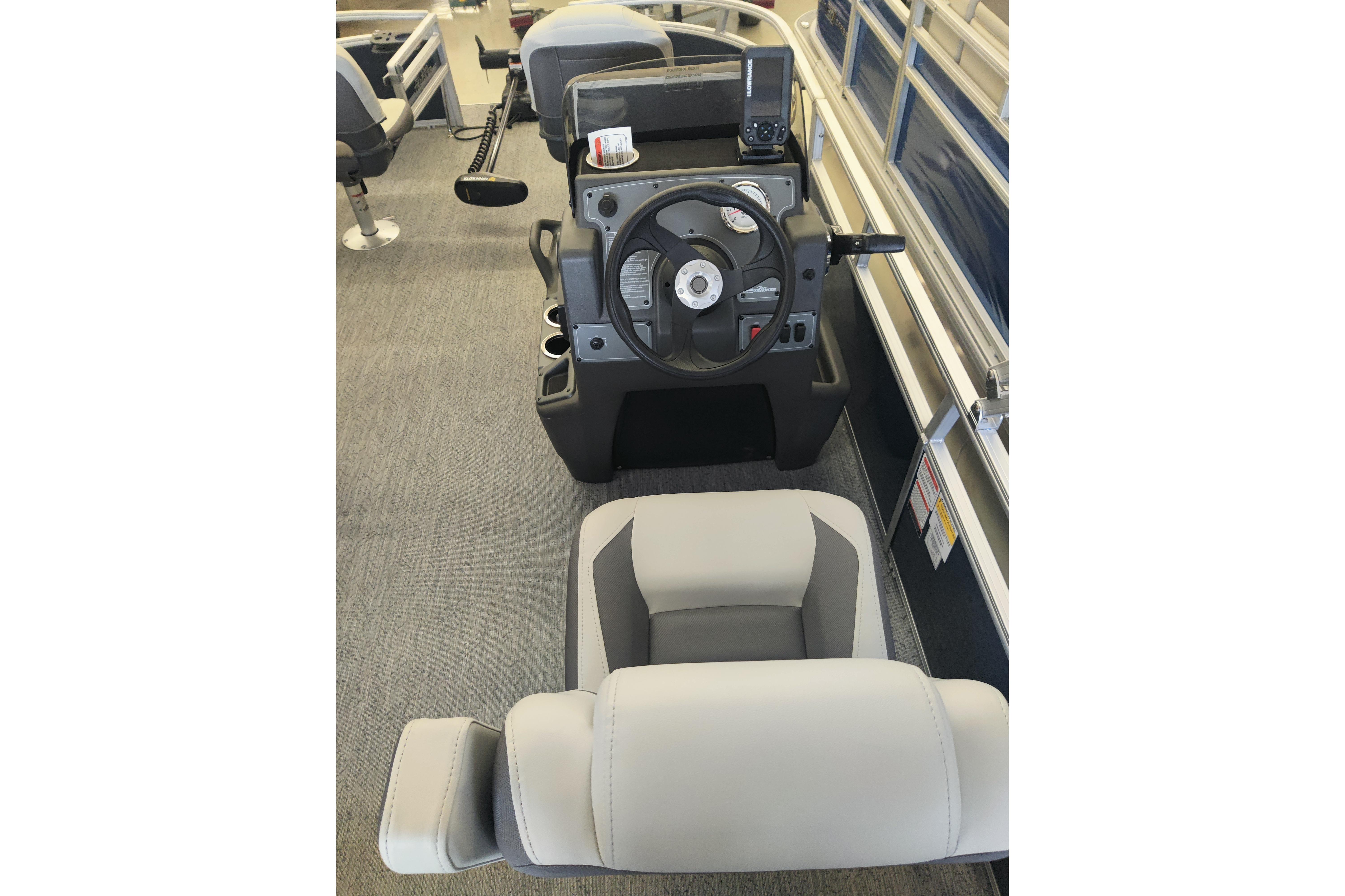 Interior view of 2026 Sun Tracker Bass Buggy 16 XL Select boat cockpit and seating.