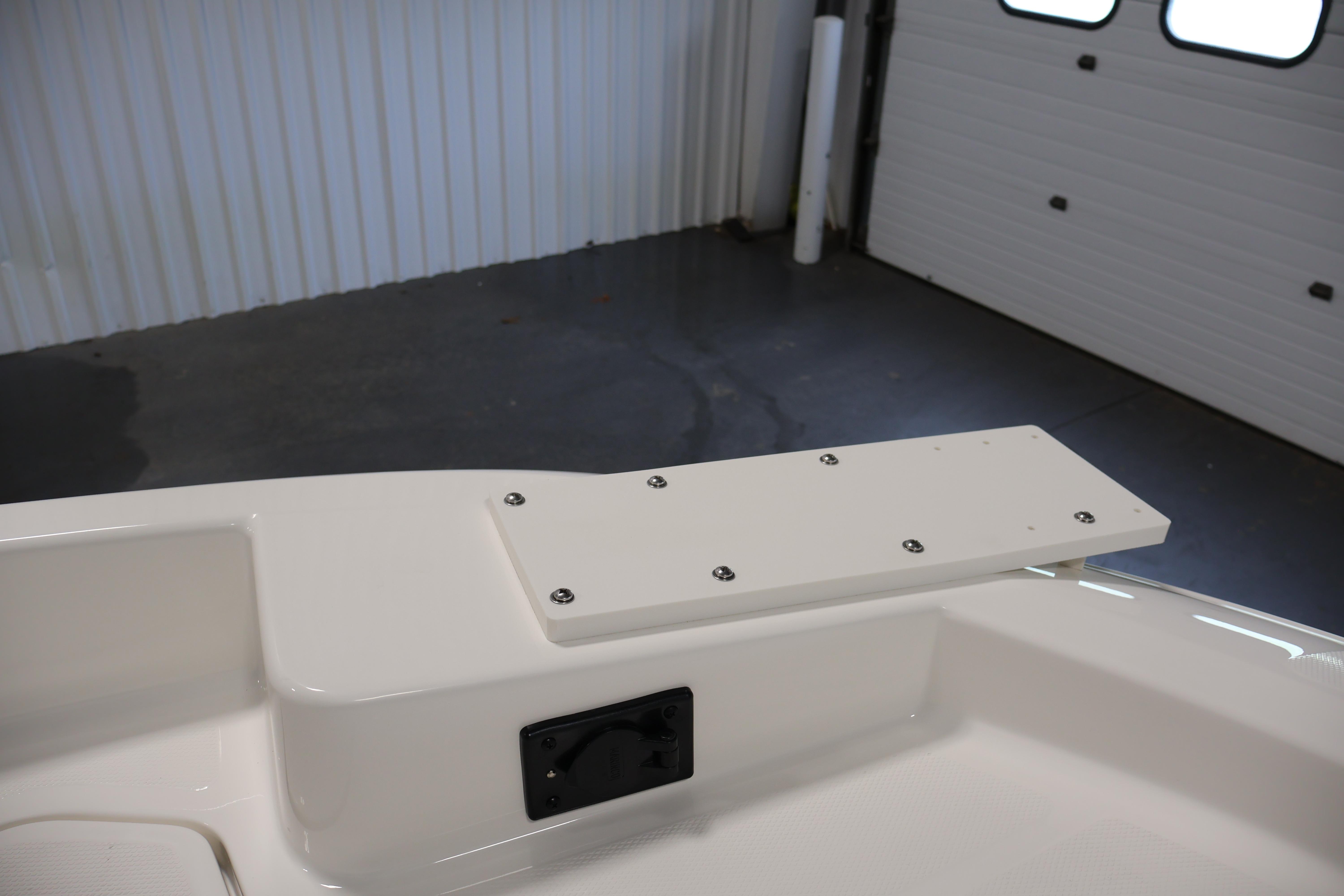 2026 Bayliner Trophy T18 boat interior detail in a garage setting.