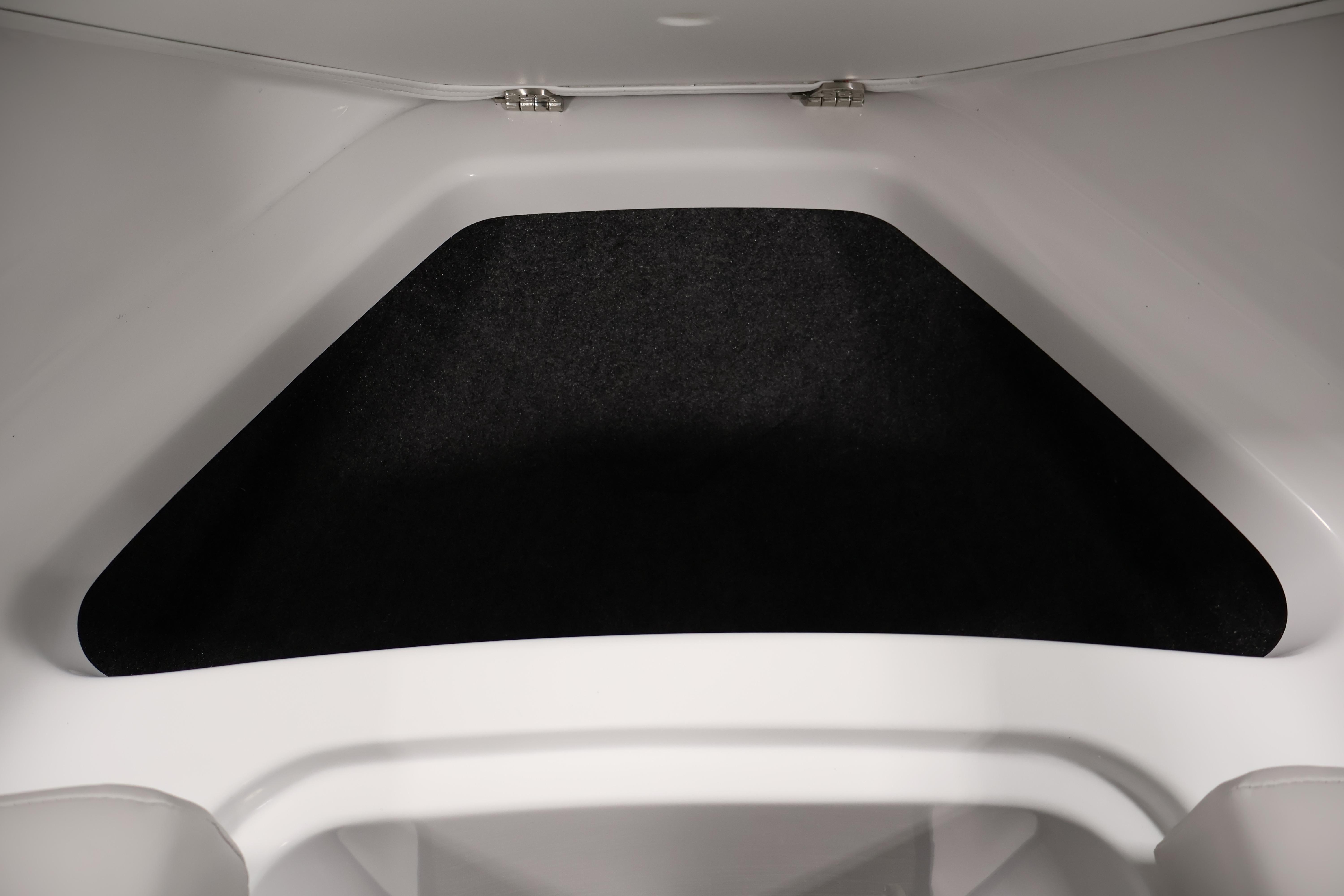 Interior view of 2026 Four Winns H4 Freedom boat storage compartment.