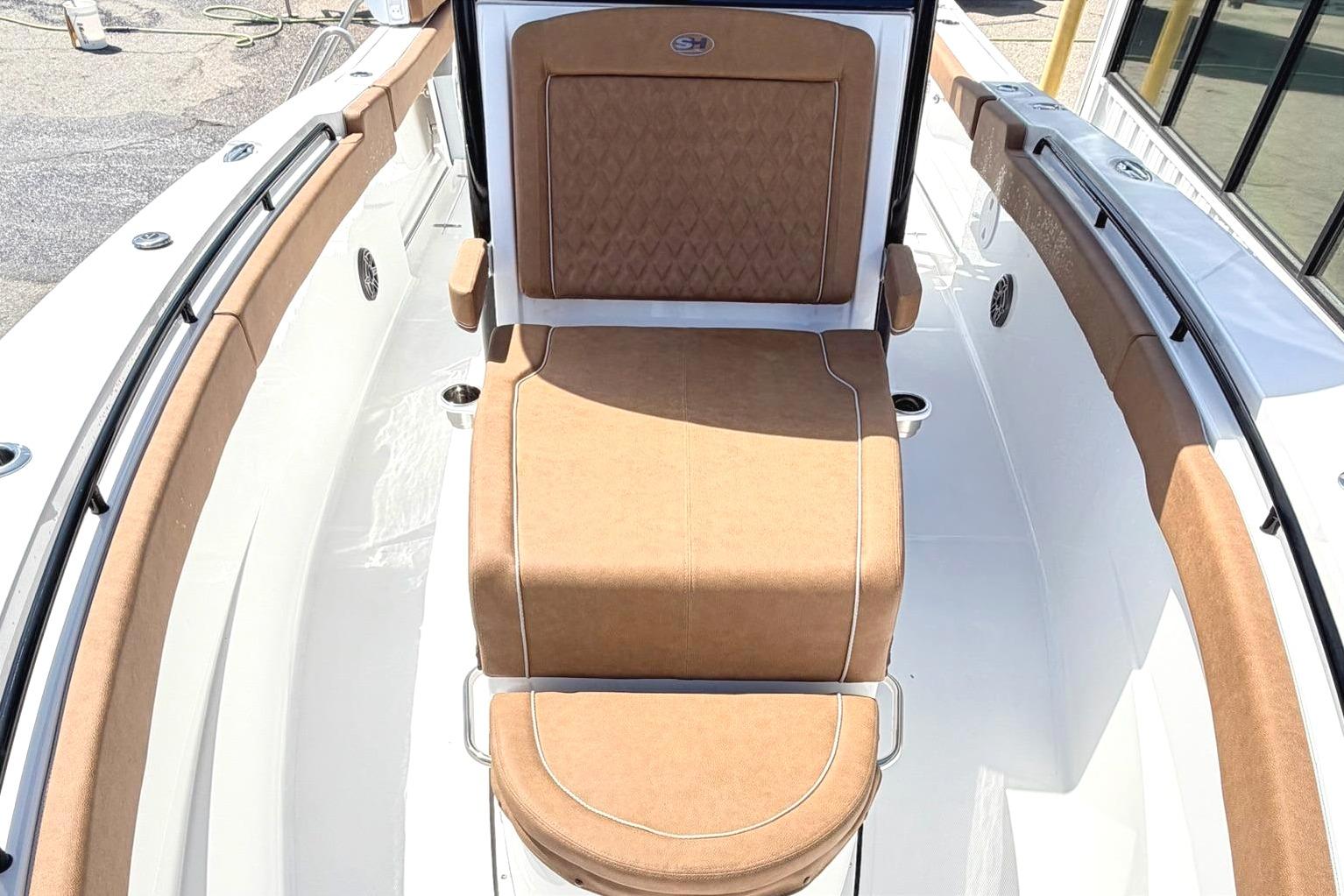 Sea Hunt Ultra 305 Coffin Box 2026 with brown upholstery.