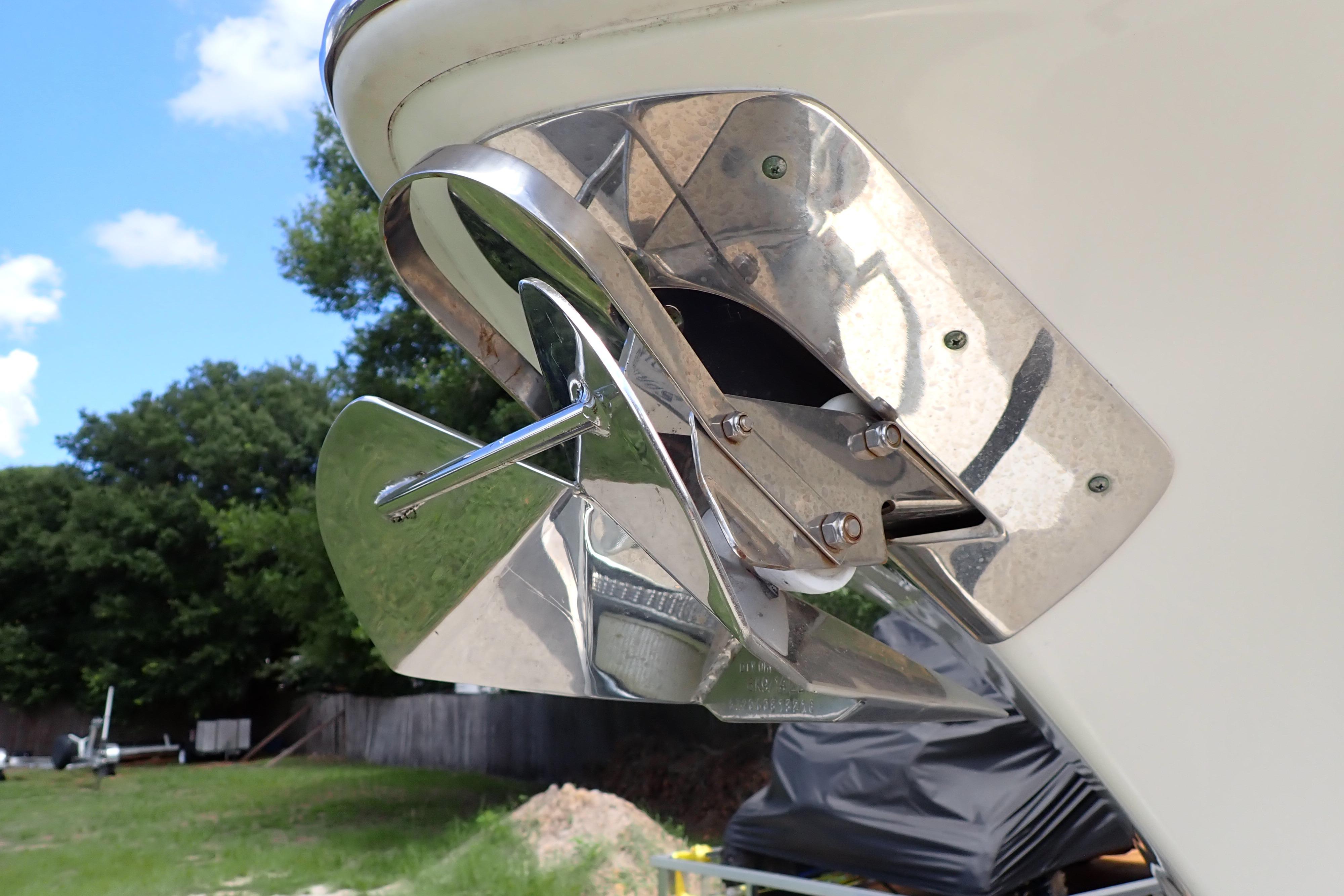 Close-up of a 2019 Key West 263 FS boat anchor, shiny metal finish.
