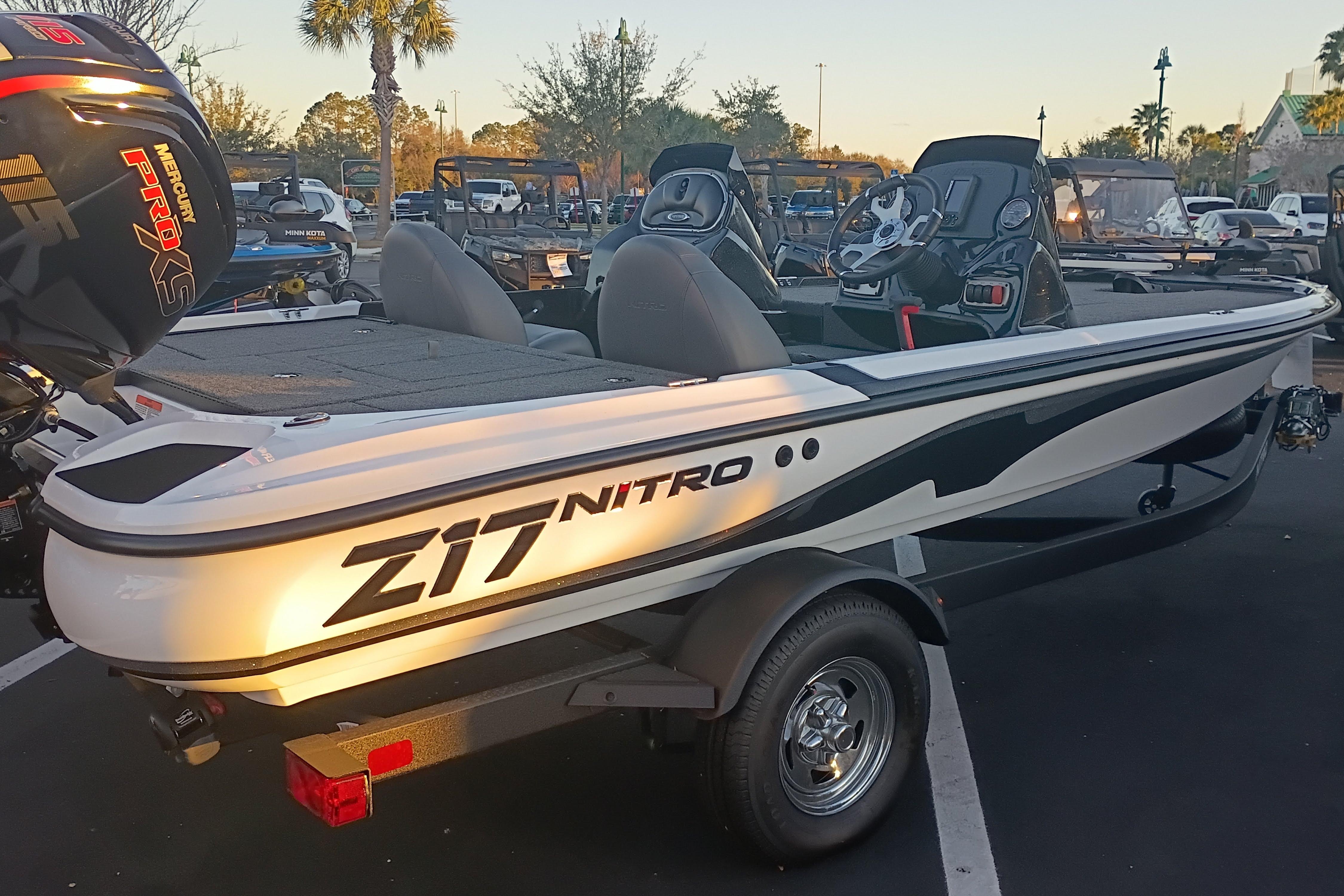 2026 Nitro Z17 boat with Mercury Pro XS engine in a parking lot.