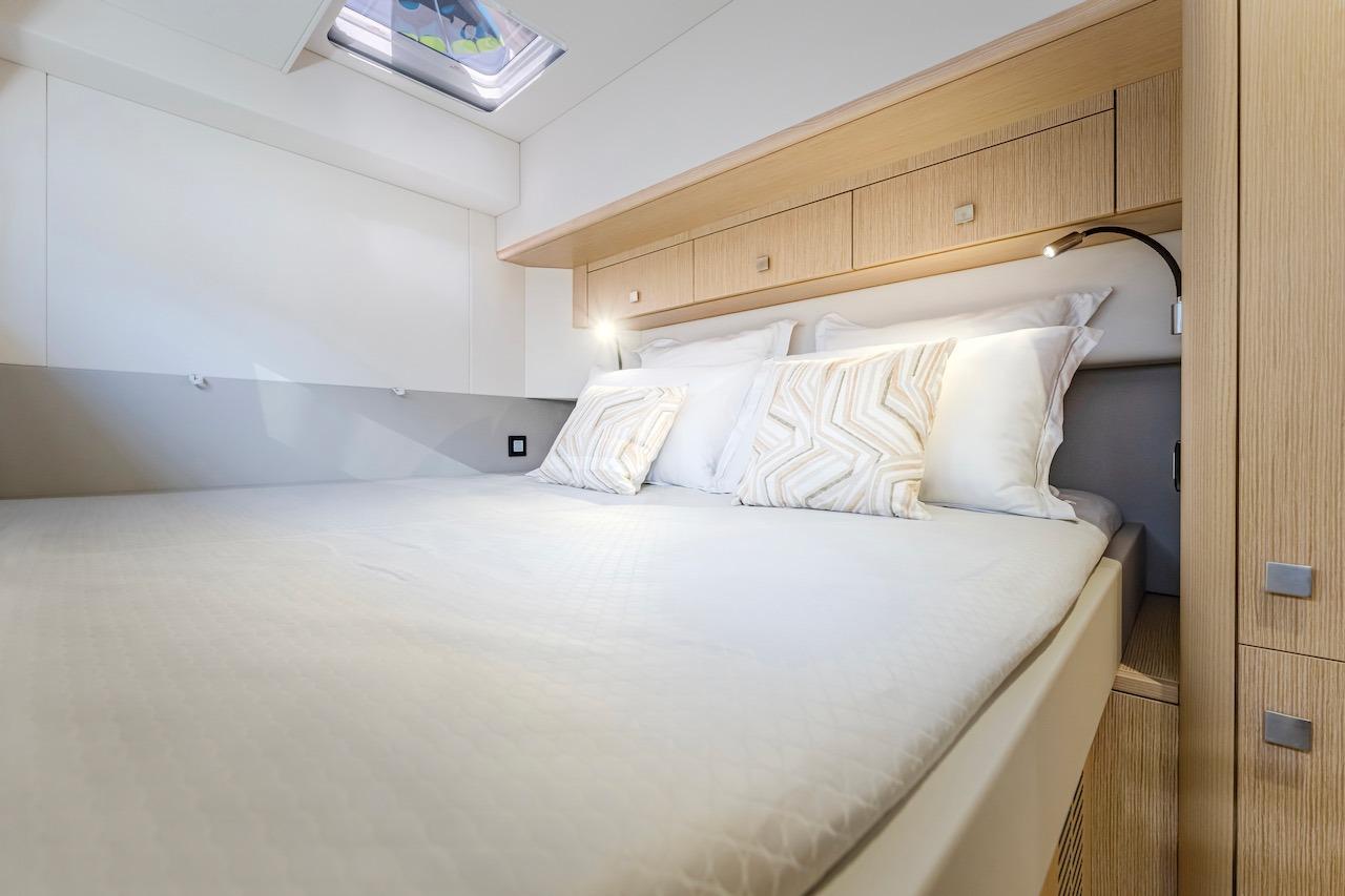 Luxurious bedroom in Privilege Signature 510 yacht, year 2025.