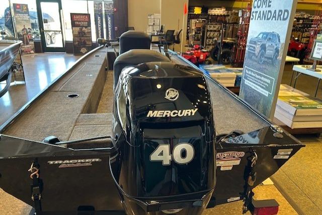 2025 Tracker Panfish 17 boat with Mercury 40 engine displayed in showroom.