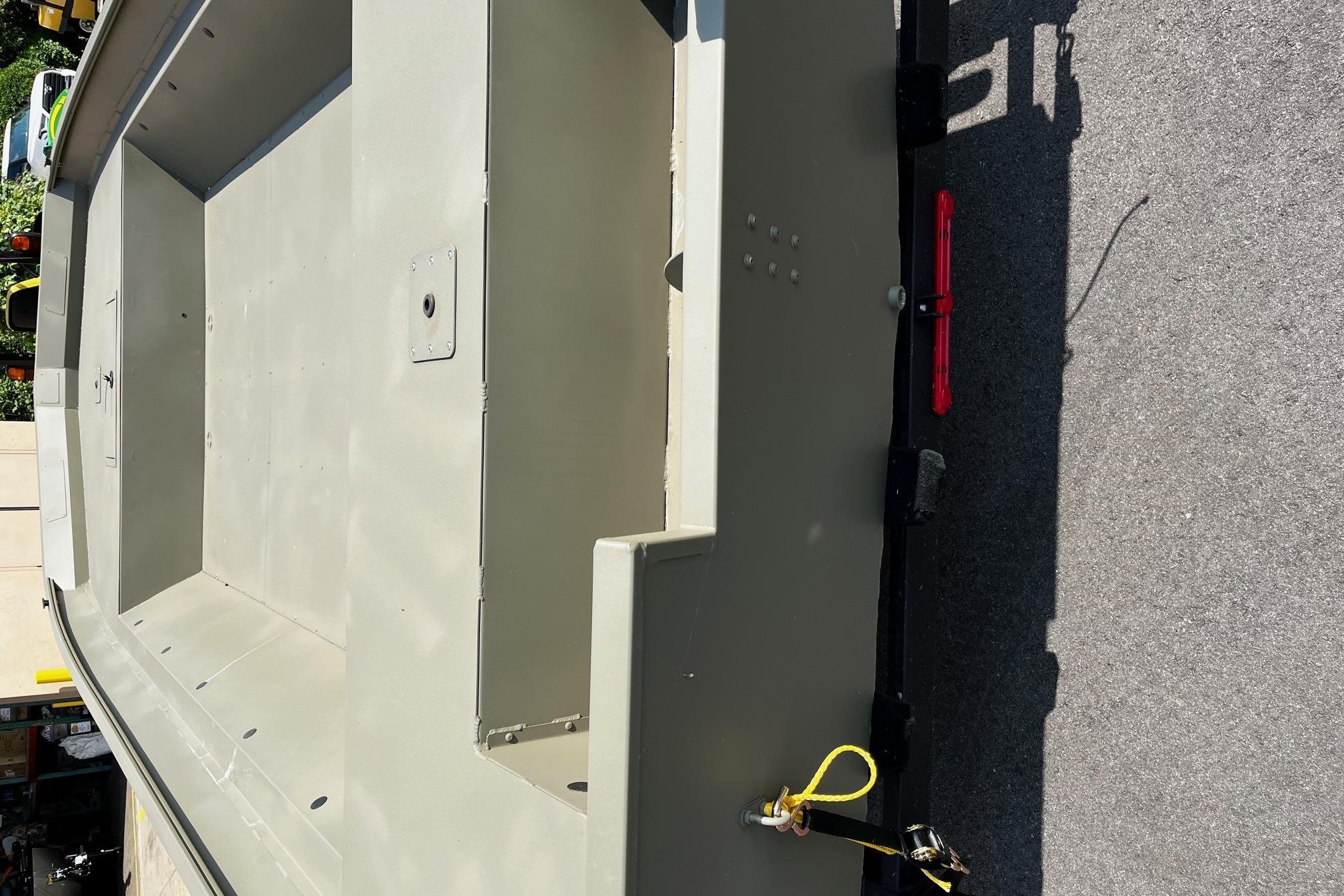 2026 Tracker GRIZZLY 2072 Utility boat on trailer, viewed from above.