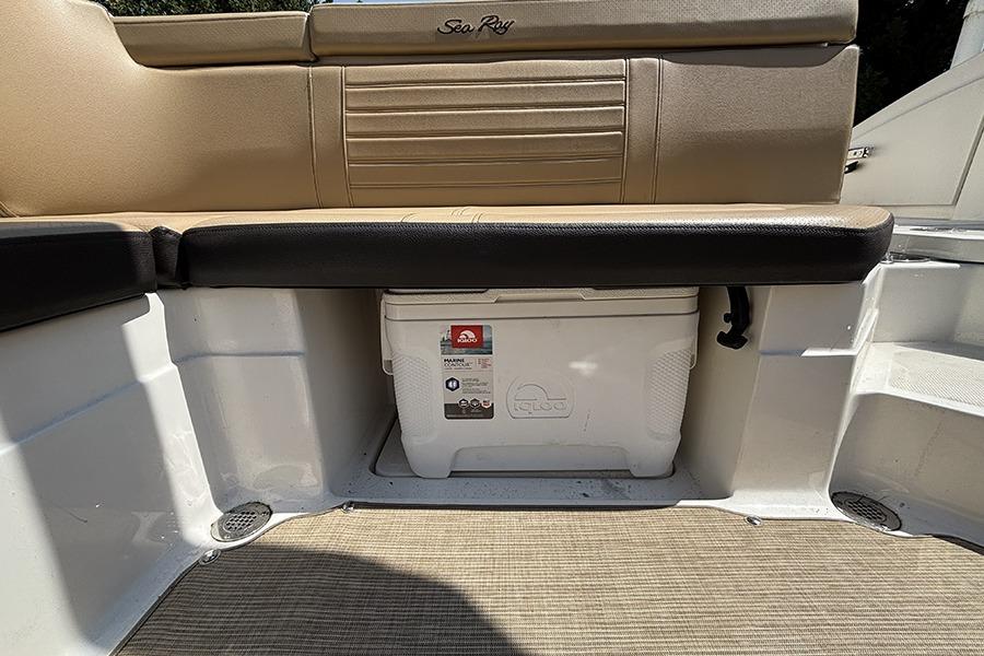 2019 Sea Ray SPX 230 Outboard boat interior with cooler storage under seat.