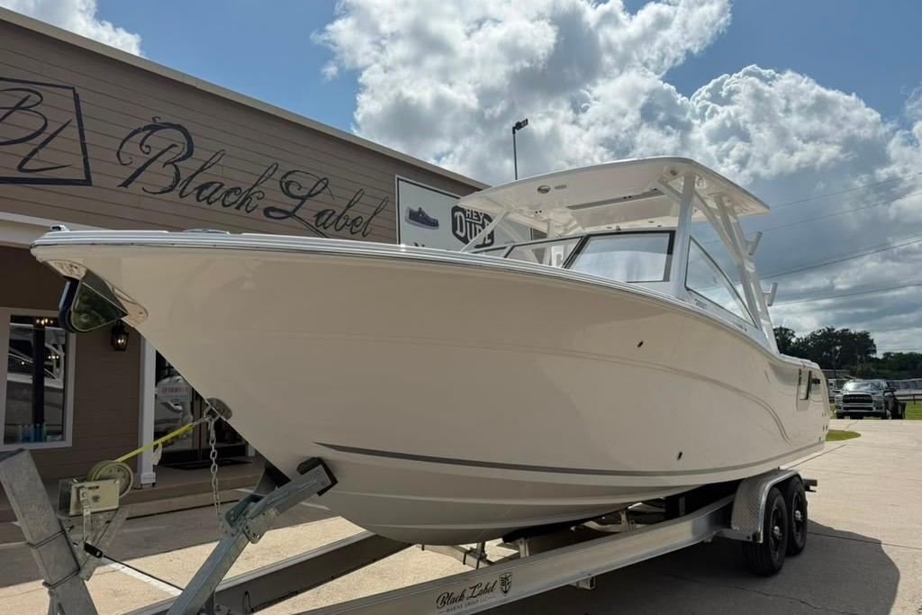 2026 Sea Fox 288 Traveler boat on trailer outside Black Label dealership.