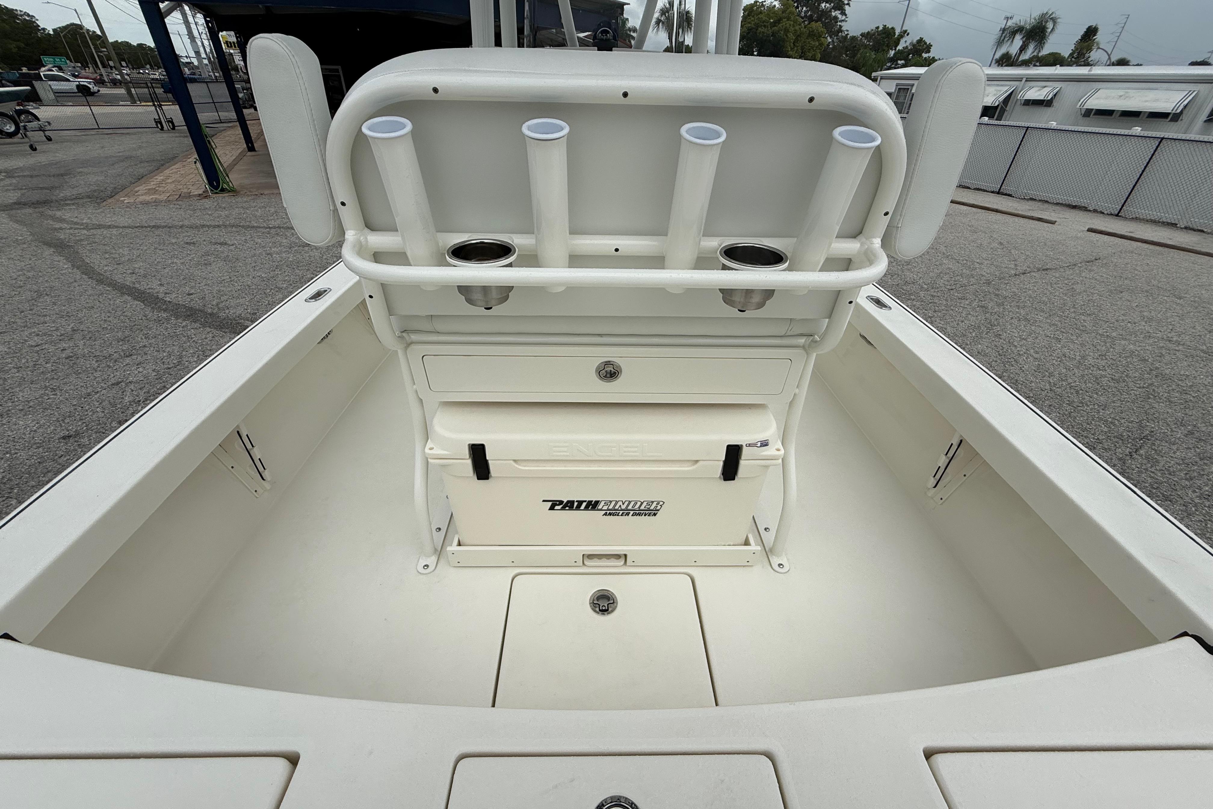 2026 Pathfinder 2300 HPS boat interior with rod holders and storage compartments.