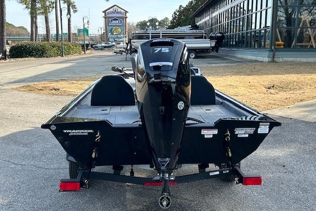 2026 Tracker Pro Team 175 boat with Mercury 75 engine, parked outdoors.