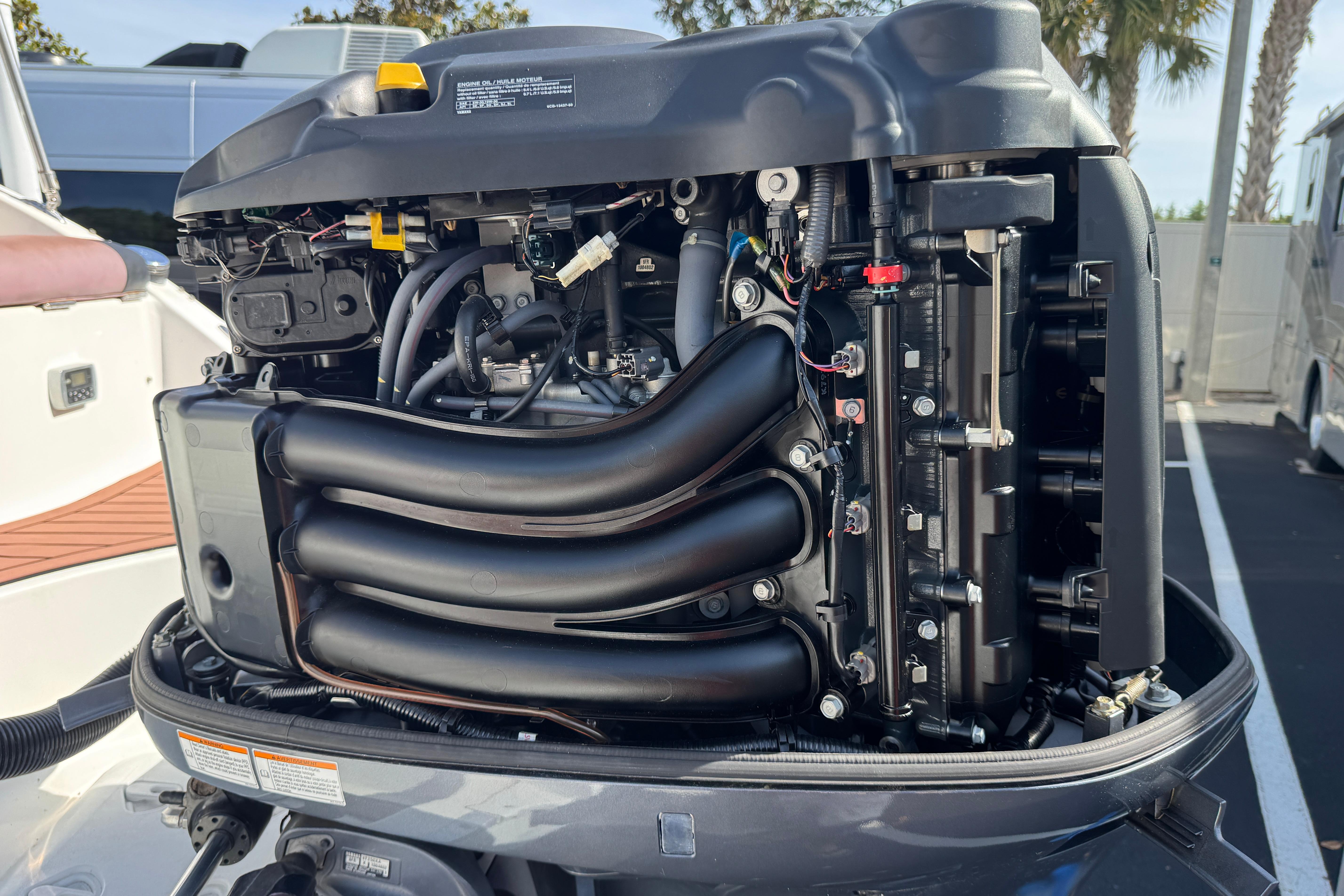 2018 Hurricane SunDeck 2400 OB outboard engine, detailed view of internal components.