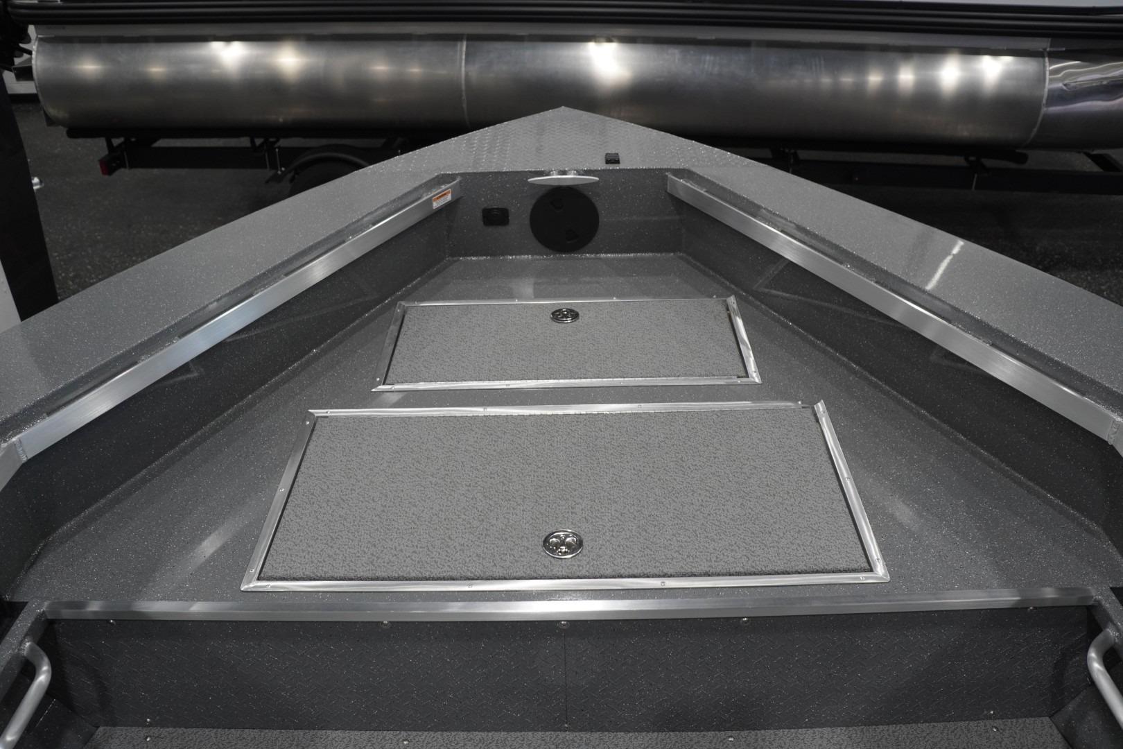 2026 Thunder Jet 209 Rush OT boat interior with storage compartments.