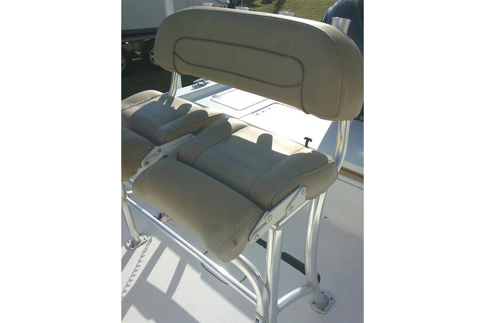 2017 Sportsman Masters 207 Bay Boat seat with beige upholstery and metal frame.