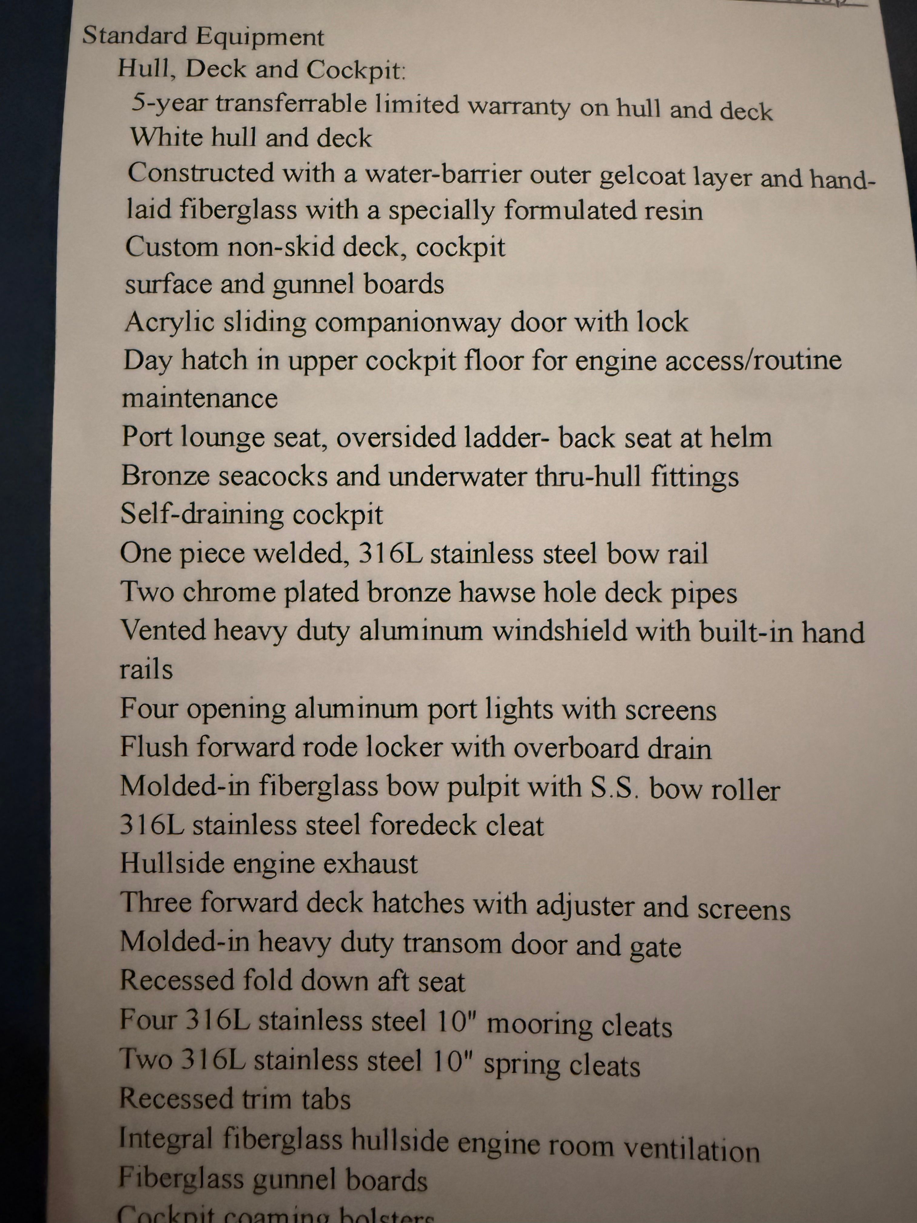 Equipment list for the 2002 Pursuit 3000 Express detailing hull, deck, and cockpit features.