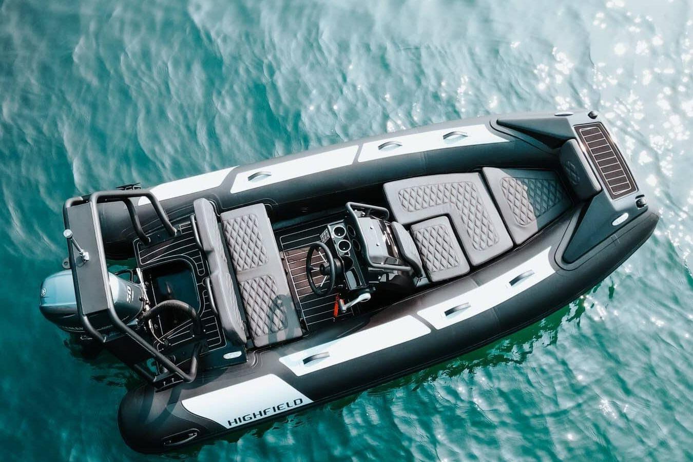 Manufacturer Provided Image: 2025 Highfield Sport 390 boat on clear blue water, aerial view.