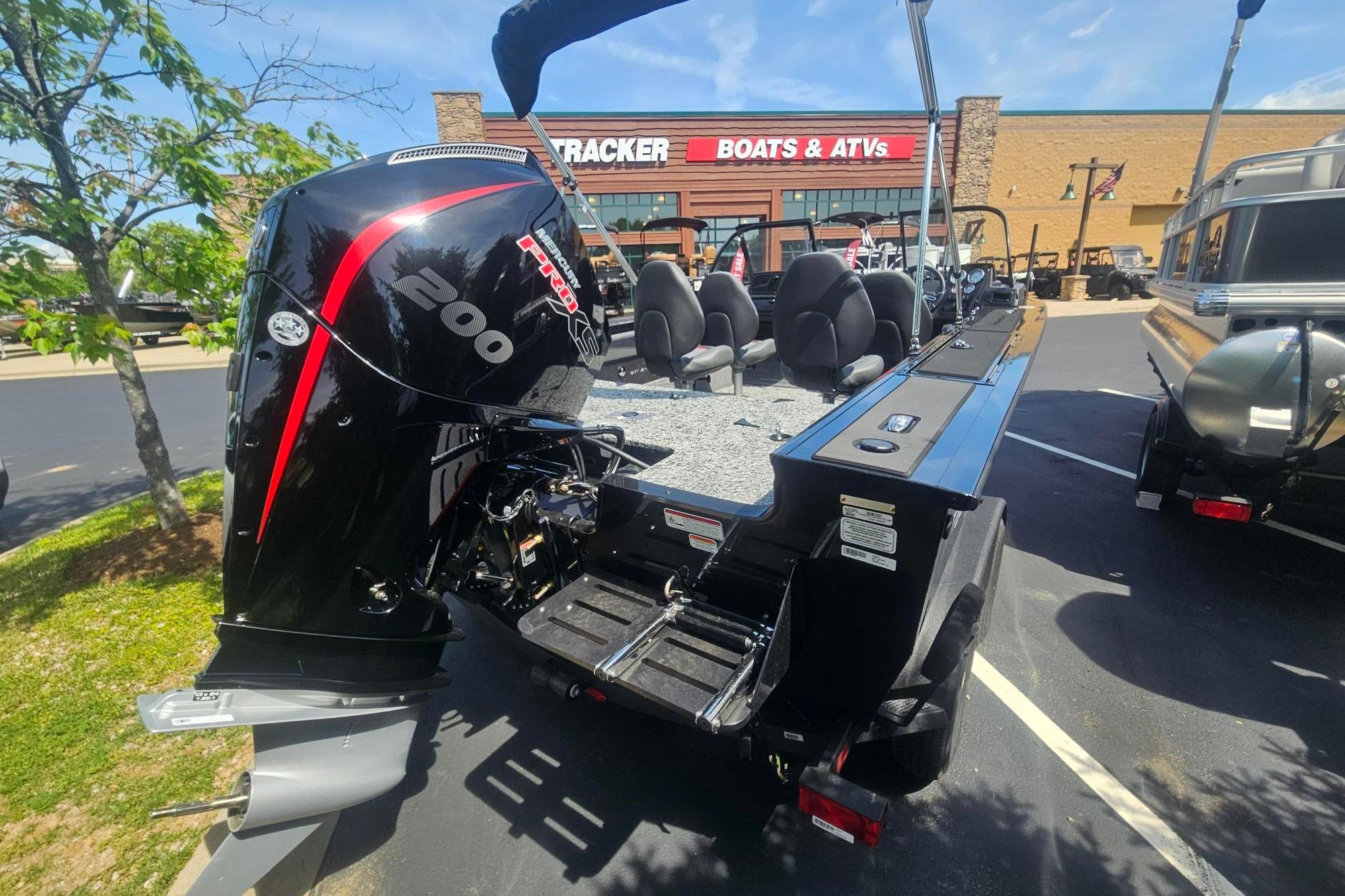 2026 Tracker Targa V-19 Combo boat with powerful 200 HP engine at dealership.