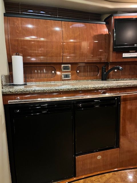 Luxurious kitchen in a 2005 Sea Ray Sundancer yacht.