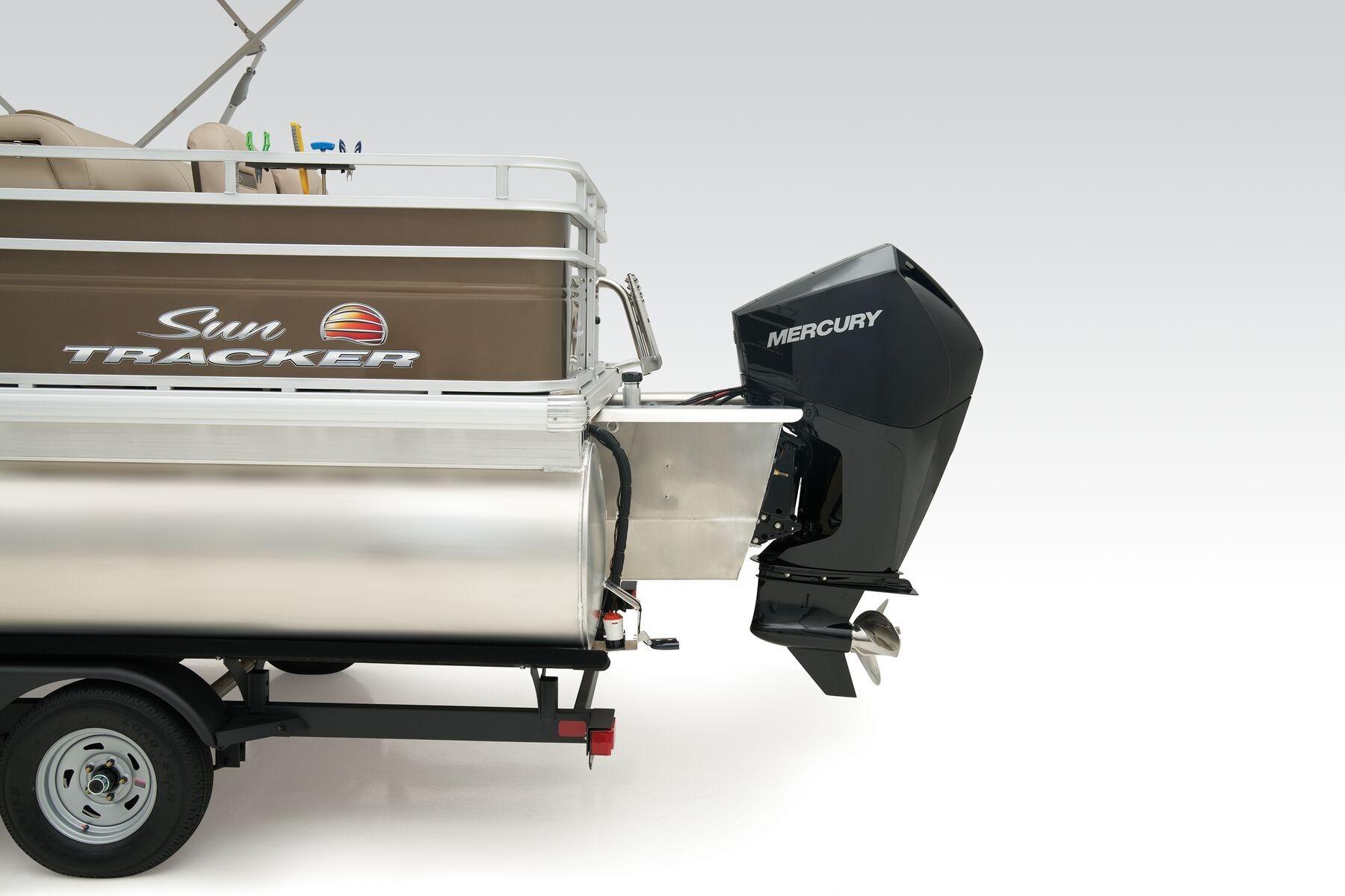 2023 Sun Tracker SportFish 22 XP3 pontoon boat with Mercury outboard motor.
