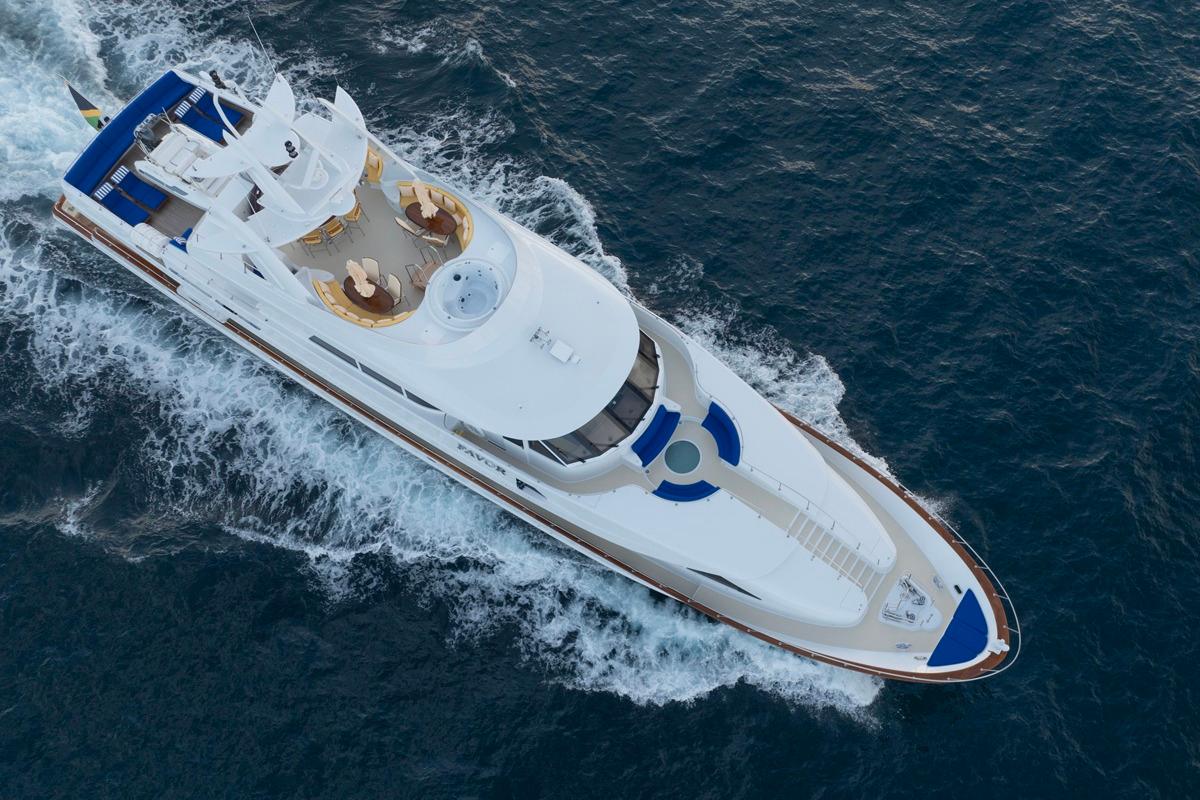 Aerial view of 2000 Crescent Custom Yachts cruising on open water.