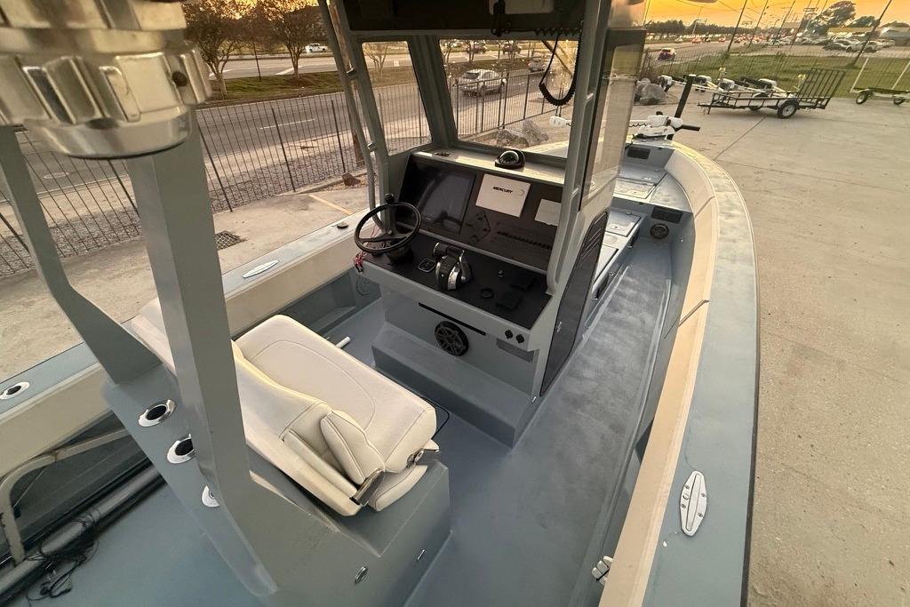 2019 Metal Shark 28 CC boat interior with steering console and seating.