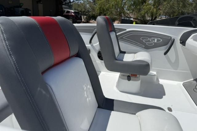 2026 Tahoe T21 boat interior with gray and red seating, modern design.