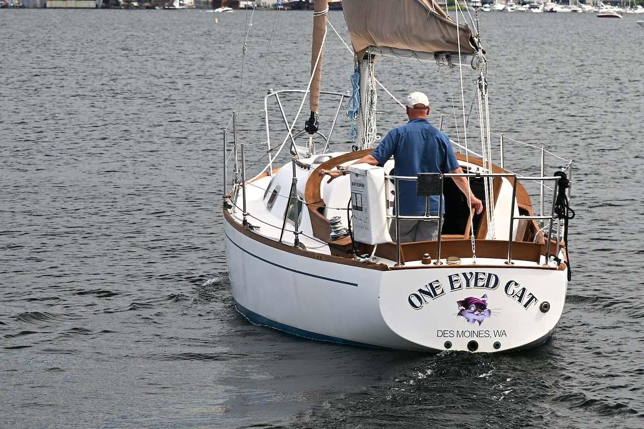 1977 Mercator Offshore sailboat named "One Eyed Cat" on the water in Des Moines, WA.