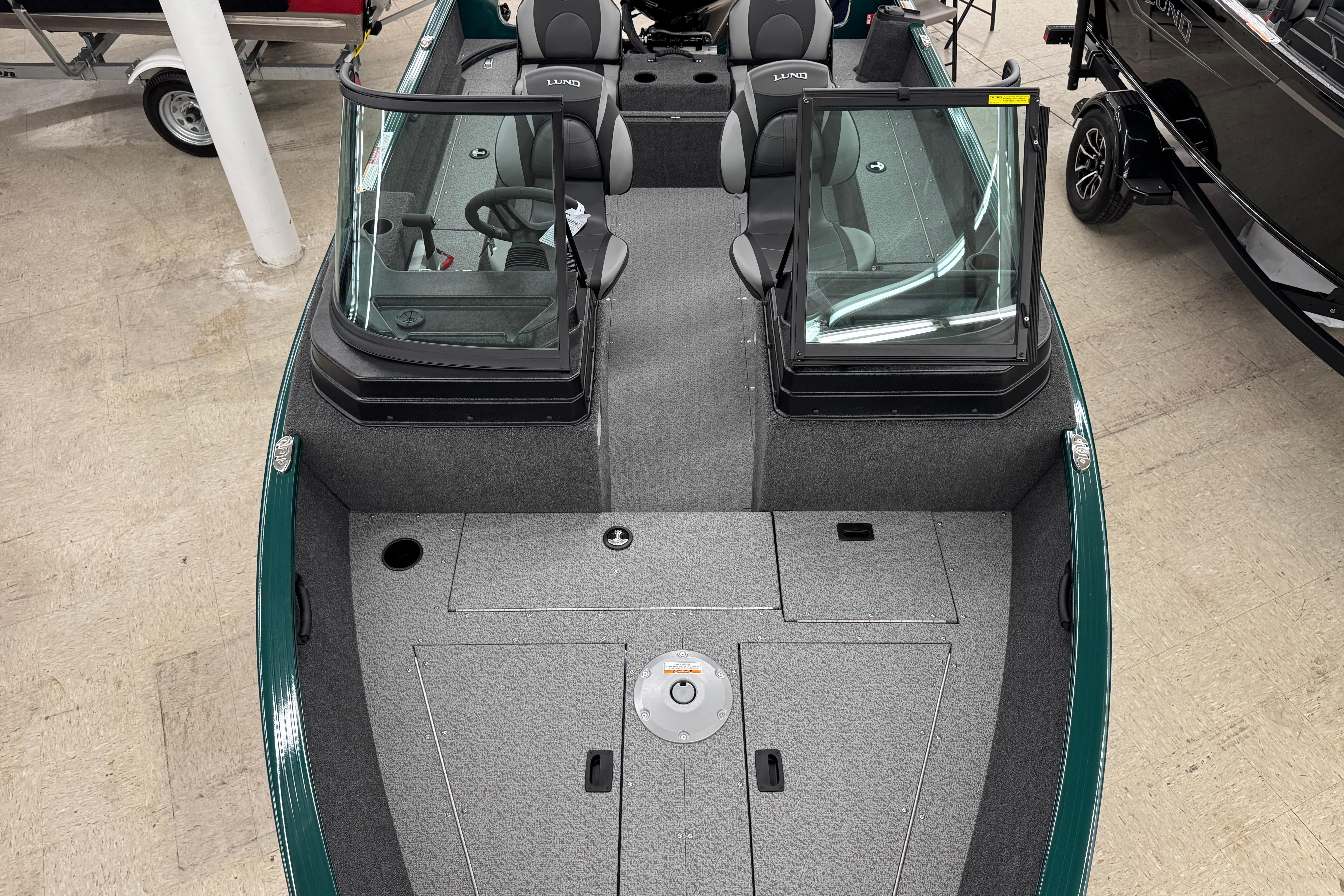 2026 Lund 1650 Rebel XL Sport boat interior with dual consoles and seating.