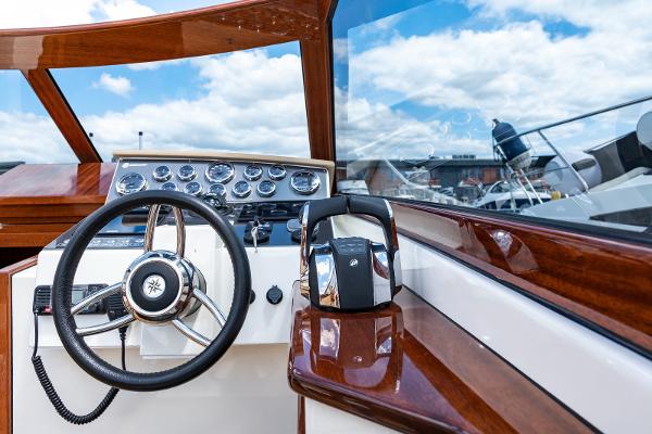 Vento V40 Retro Classic Open 2023 boat dashboard with steering wheel and controls.