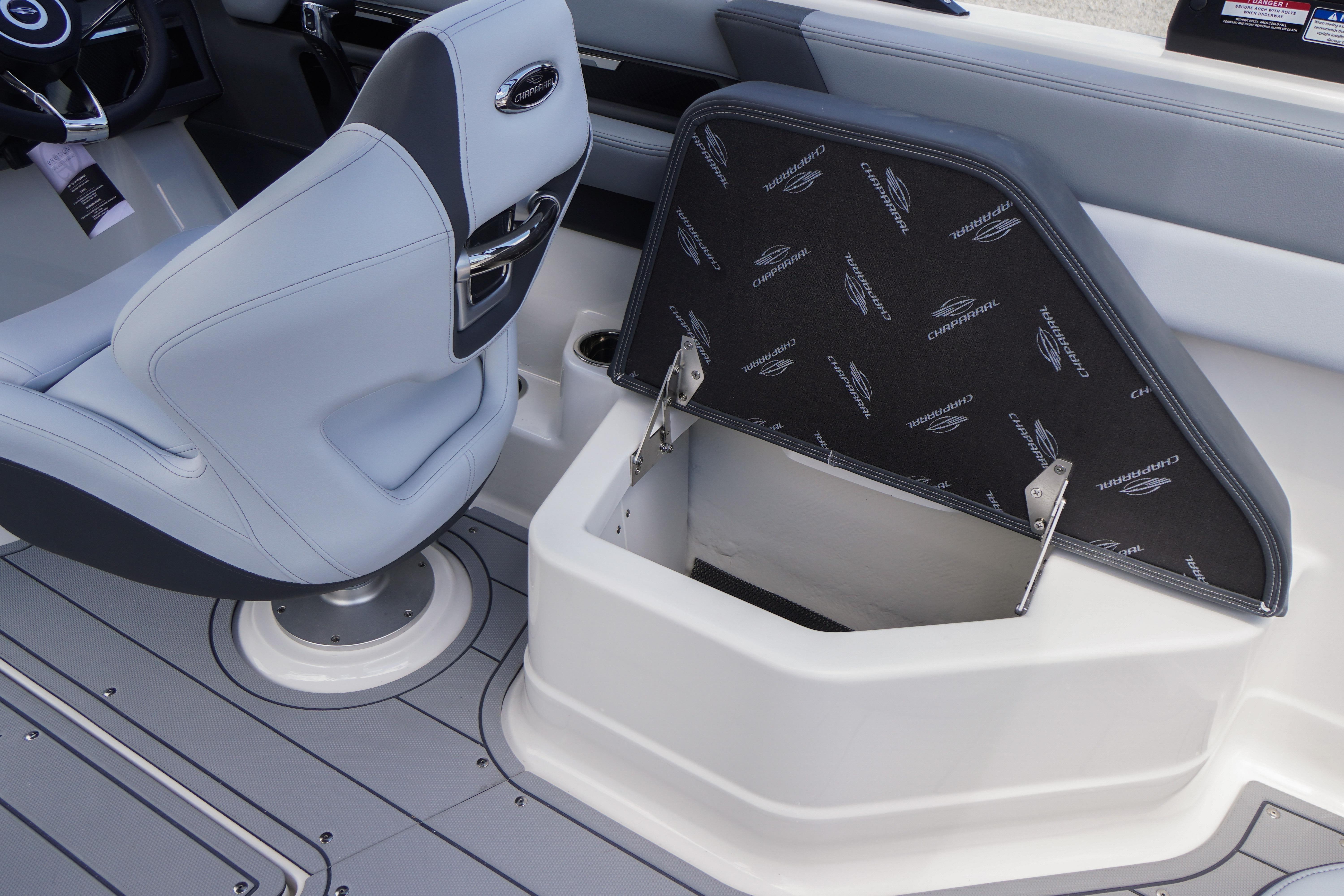 2026 Chaparral SSX 4 boat interior with storage compartment and seating.