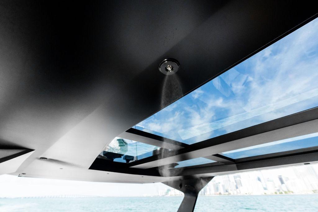 2024 Vanquish Yachts VQ55 yacht interior with skylight and water misting system.