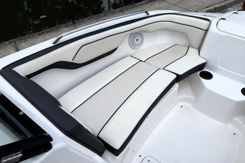 2017 Yamaha Boats SX210 interior seating with white and black upholstery.