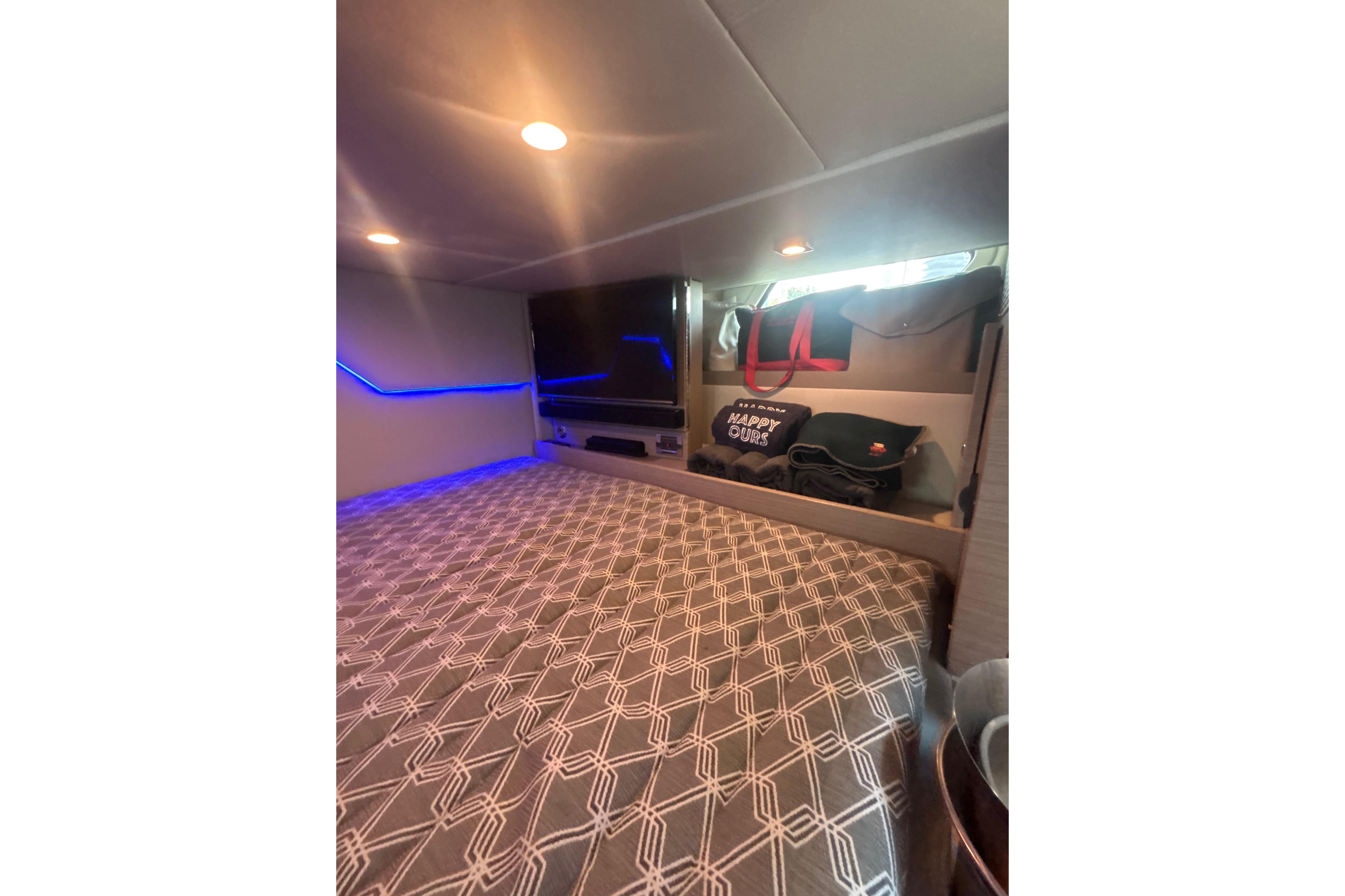 Interior cabin of 2019 Formula 430 Super Sport Crossover with modern lighting and storage.