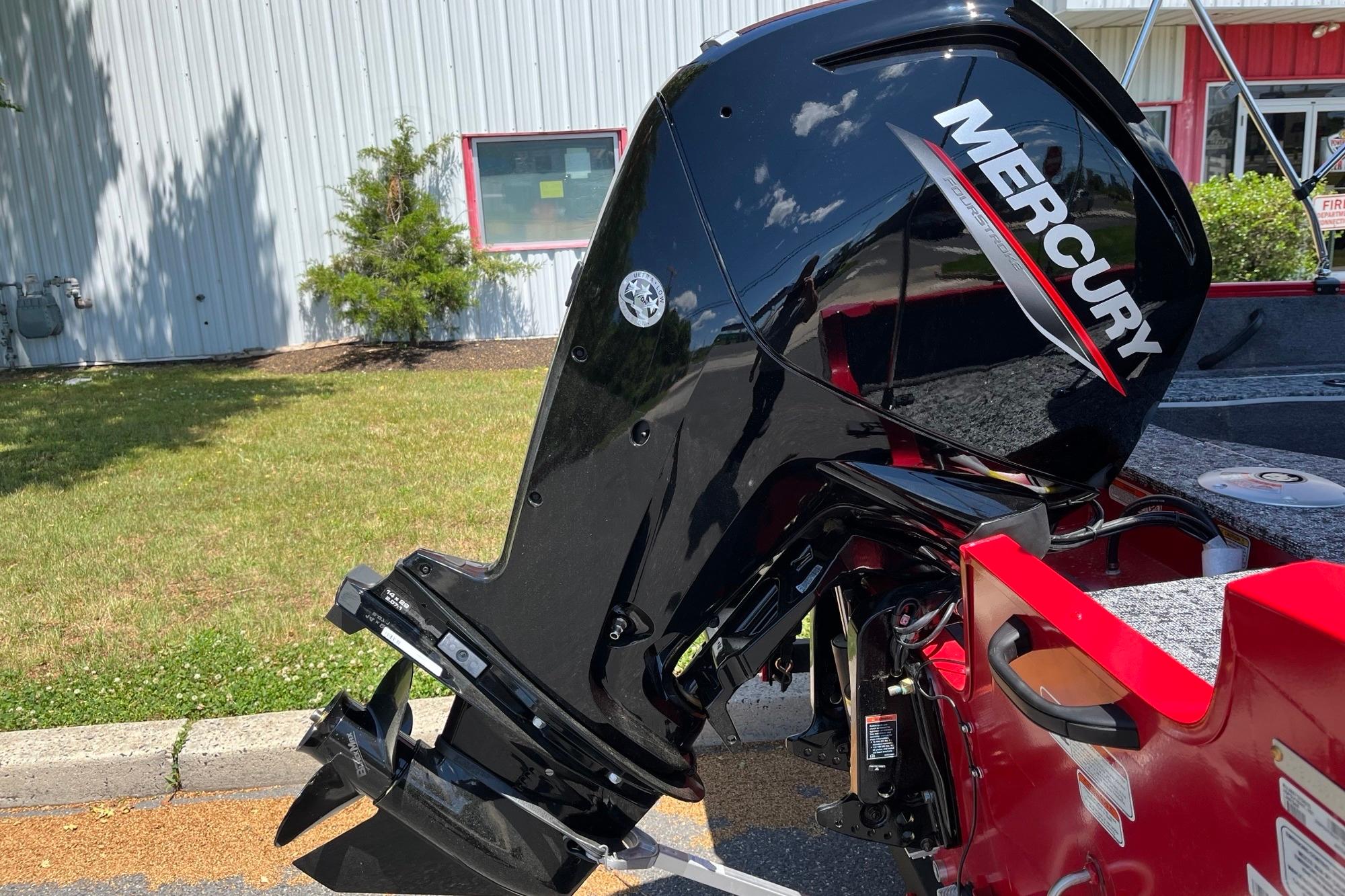 2026 Tracker Pro Guide V-16 WT with Mercury outboard motor in a sunny outdoor setting.