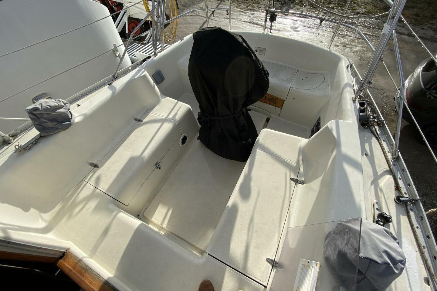 1980 CS 36 Traditional sailboat cockpit with covered helm and seating.