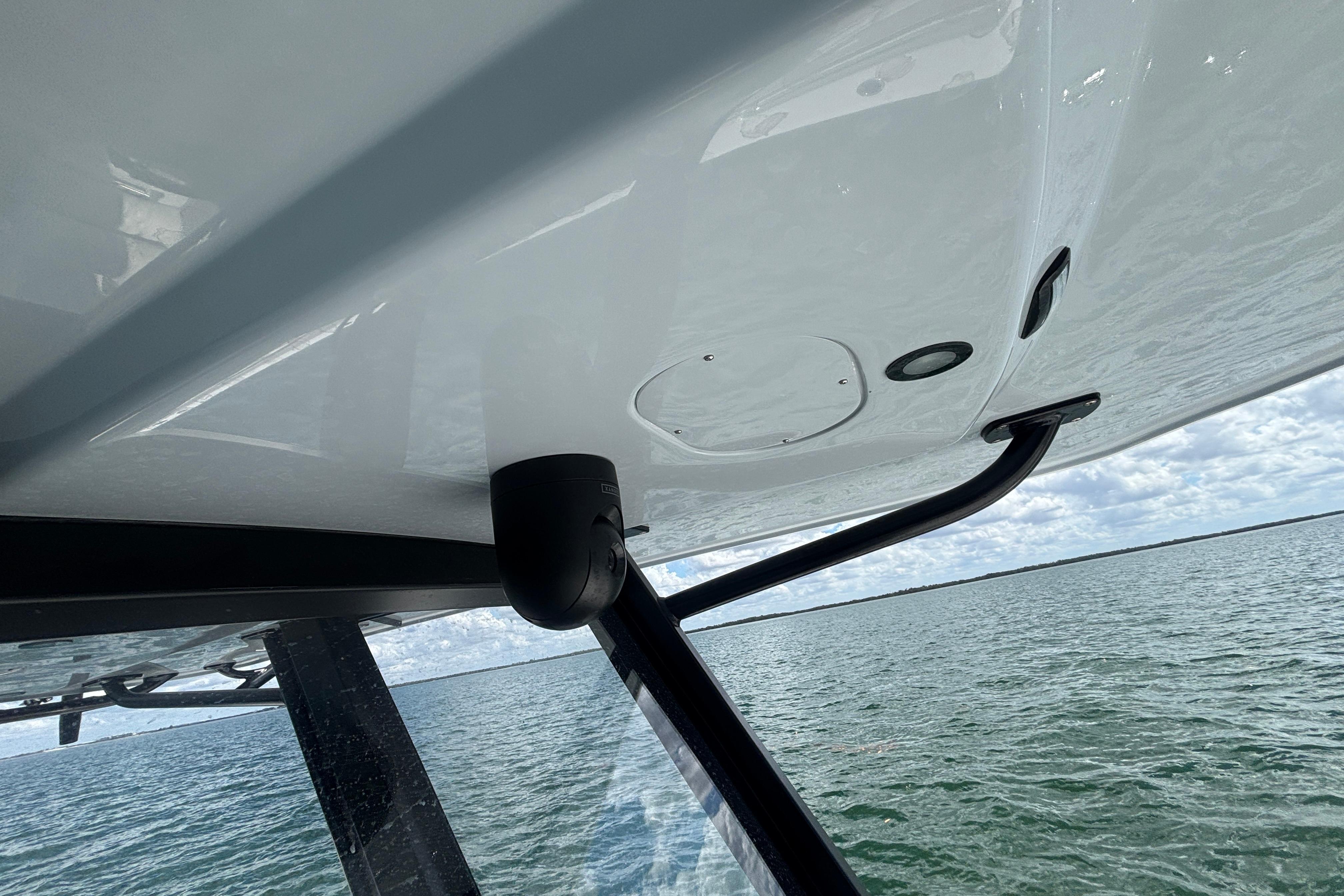 2024 Invincible 36 Open Fisherman boat detail with ocean backdrop.