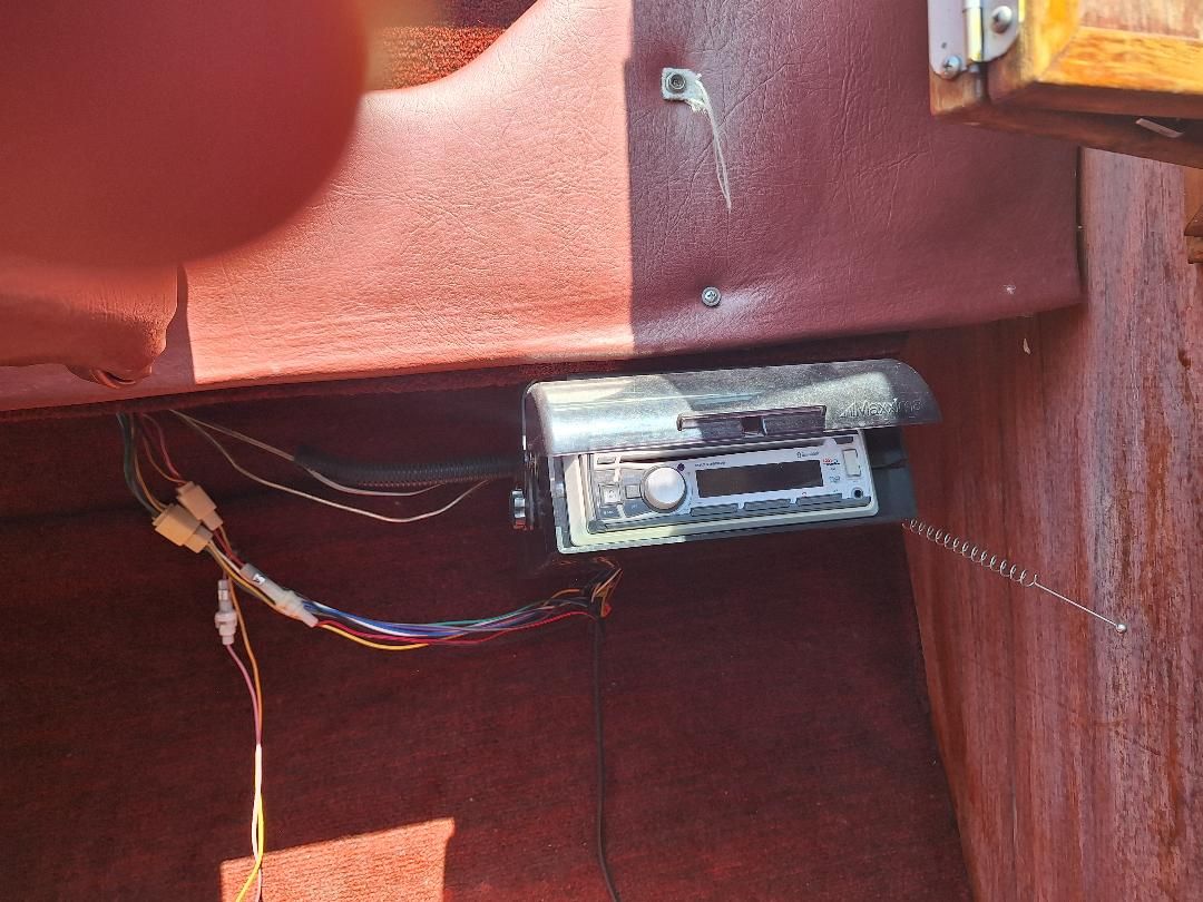 1986 Sea Ray Weekender 230 interior with radio and wiring.