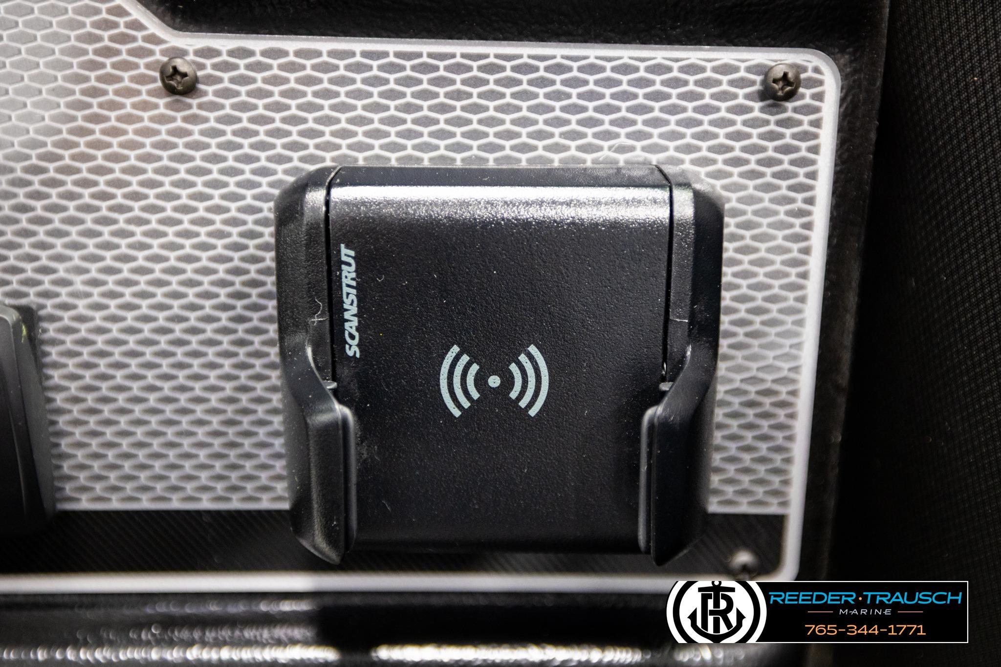 Scanstrut wireless charging mount on 2026 Lund 1975 Tyee boat dashboard.