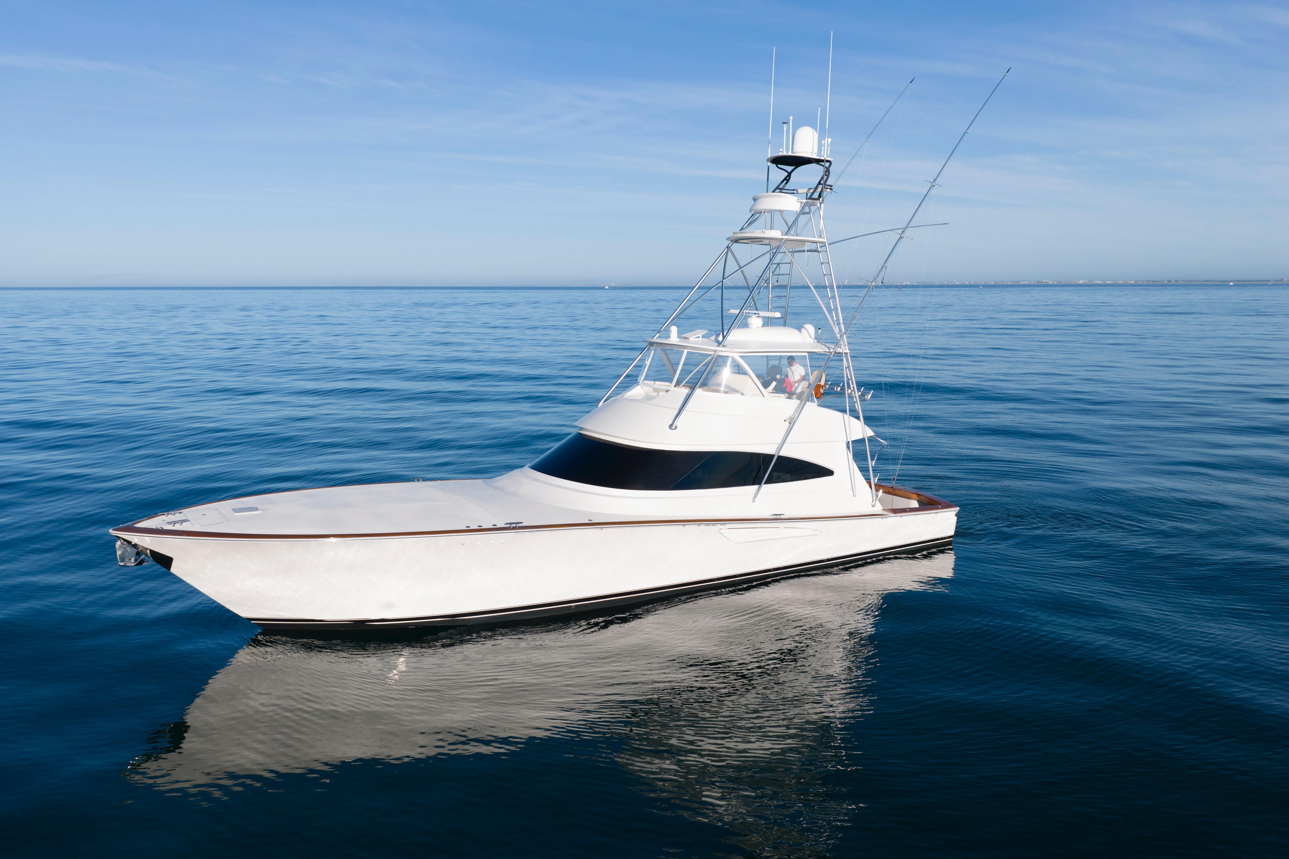 2019 Viking 68 Convertible yacht on calm ocean waters.