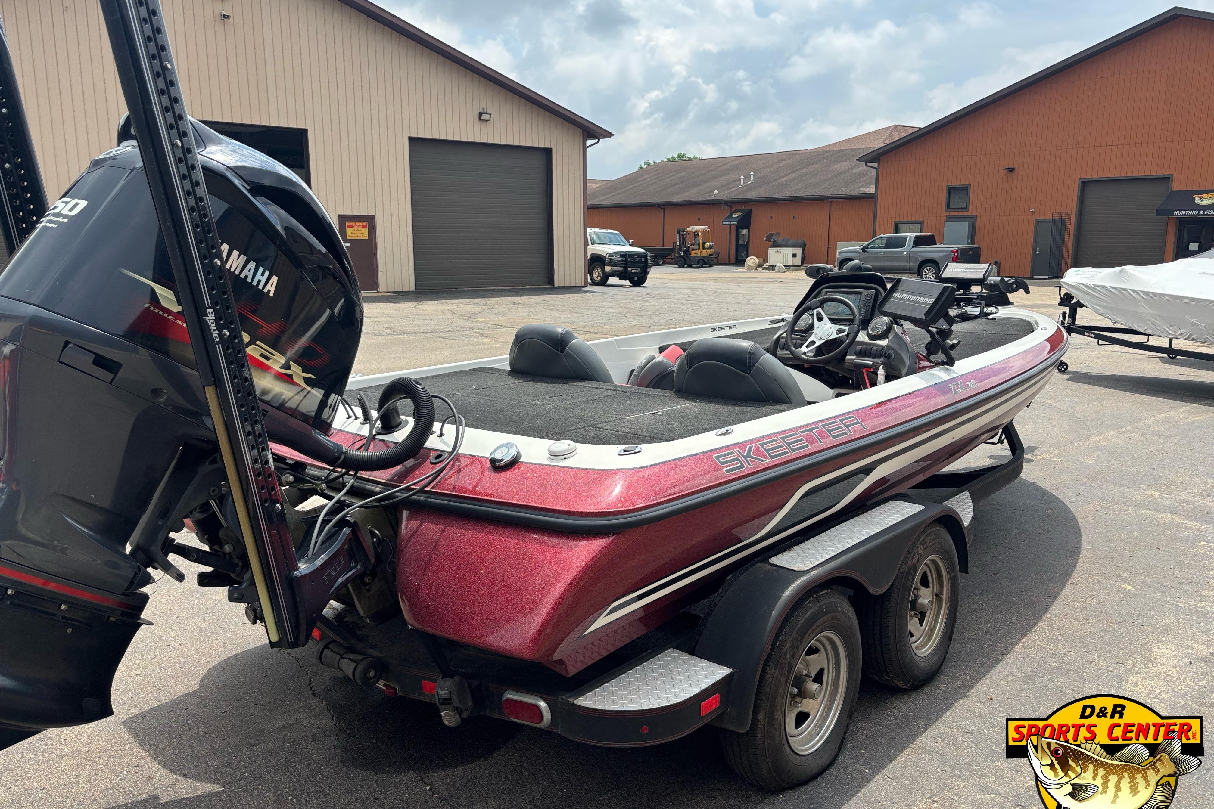 2013 Skeeter ZX20 boat with Yamaha engine, parked at D&R Sports Center.