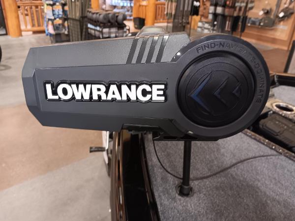 Lowrance navigation system on 2025 Ranger ALPHA 208 boat, displayed in a showroom.