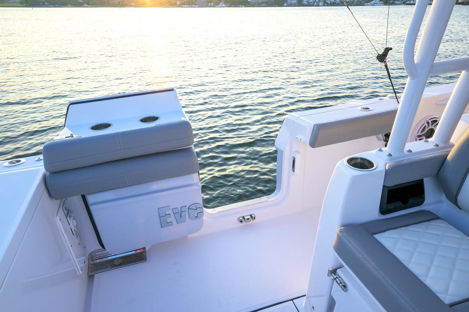 Manufacturer Provided Image: 2026 Everglades 335 Center Console boat interior with sunset view over water.