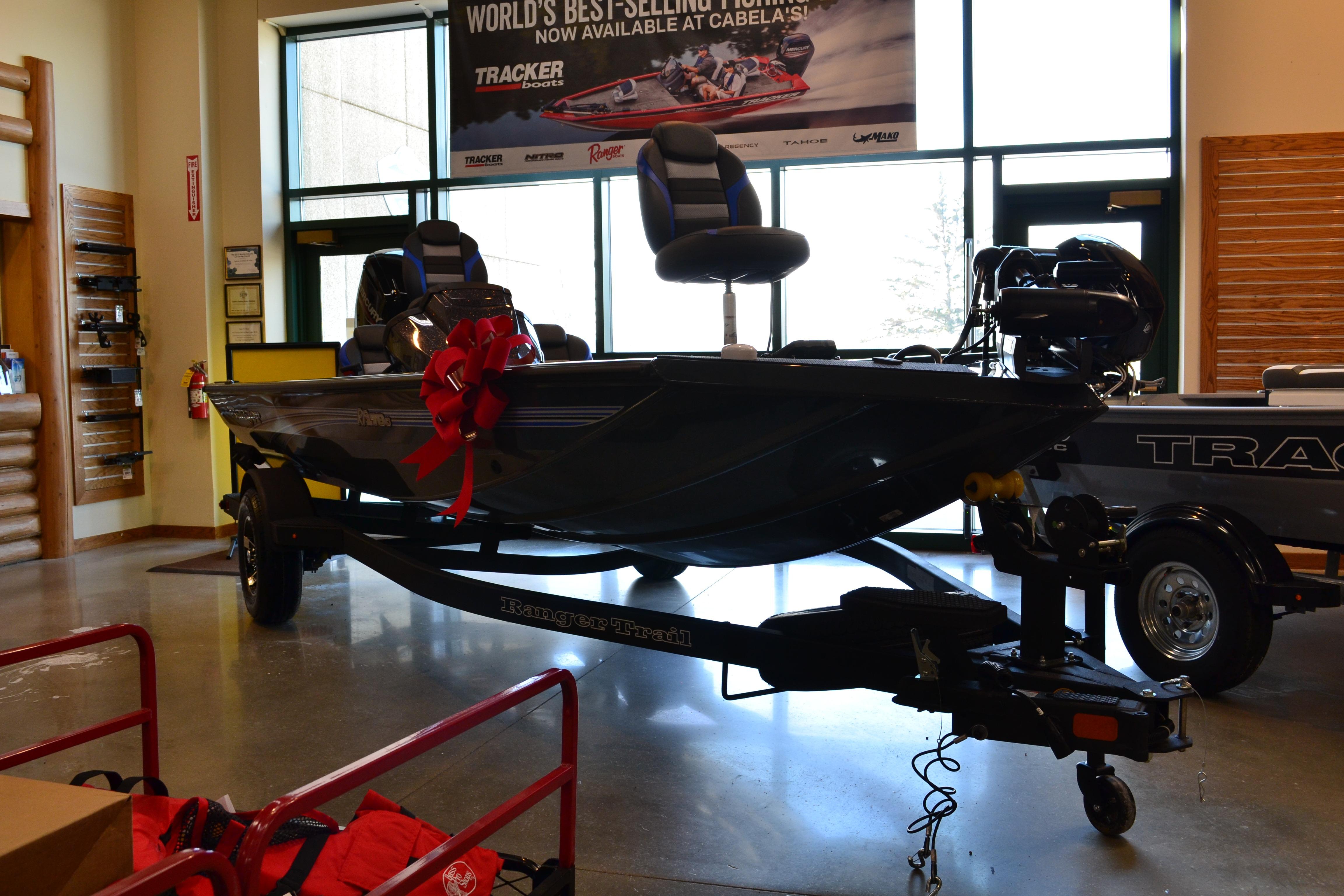 2026 Ranger RT178C fishing boat displayed indoors with a red bow.